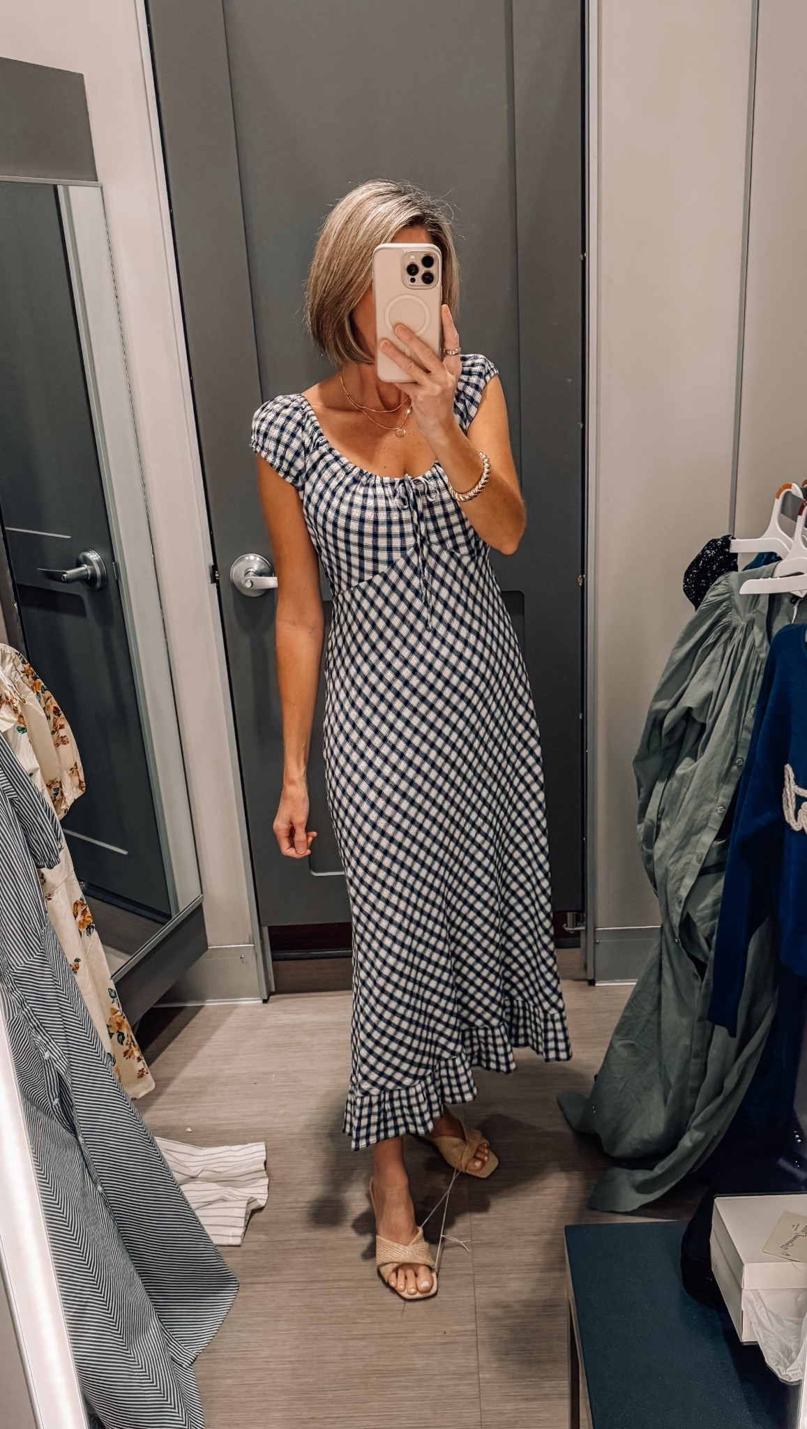 This gingham fluttery ruffle hem midi dress is such an easy throw on dress for spring and summer. Wearing a small 

spring outfit | gingham dress | midi dress | Easter dress | Vacation dress | ruffle hem dress | try on haul | casual spring style | summer outfit ideas | everyday dress | feminine style | neutral sandals | capsule wardrobe | classic style | mom outfit | Target dress | Target outfit | affordable fashion | target style | spring fashion 2026 | summer fashion 2026

#LTKSaleAlert #LTKootd #LTKOver40