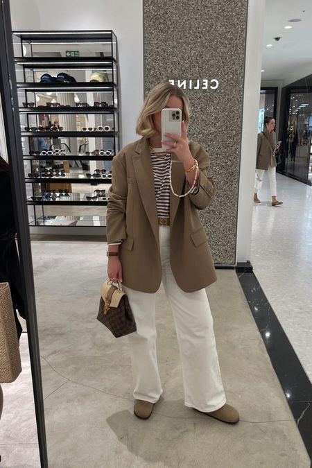 Brown & white outfit for a spring shopping day. Brown Frankie shop Bea blazer, wat the brand mocha striped top, H&M wide leg white jeans, Loewe reversible belt & Birkenstock Bostons  

#LTKstyletip #LTKeurope #LTKSeasonal