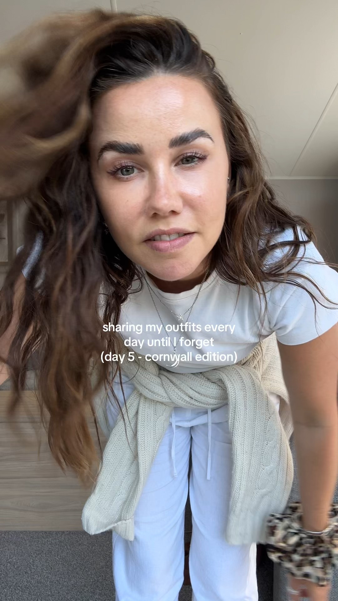 Daily outfits in all white wearing linen wide leg trousers from M&S with baby tee and cable knit jumper, styled with leopard print ballet flats

#LTKuk #LTKeurope #LTKsummer