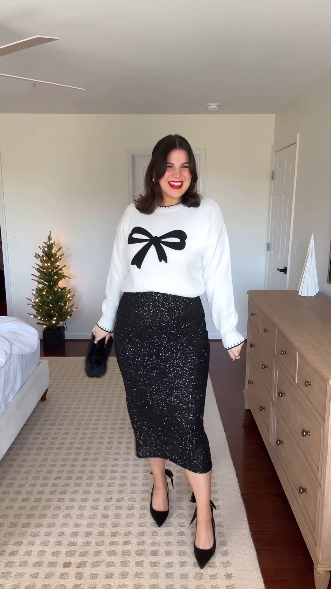 Midsize holiday outfit! You can never go wrong with sequin skirt for the holidays!! And I love this one paired with this adorable bow sweater 🥺 its giving cute + cozy but festive 🎄 

Skirt + sweater - size xl *you can save on them with the code : KELLY15 
Robe - xl 
Bralette - size xl *you can save with code:  KELLYTK20 
Heels - 9.5 

Holiday outfit, holiday style, holiday fashion, midsize, midsize outfit 

#LTKMidsize #LTKTall #LTKHoliday
