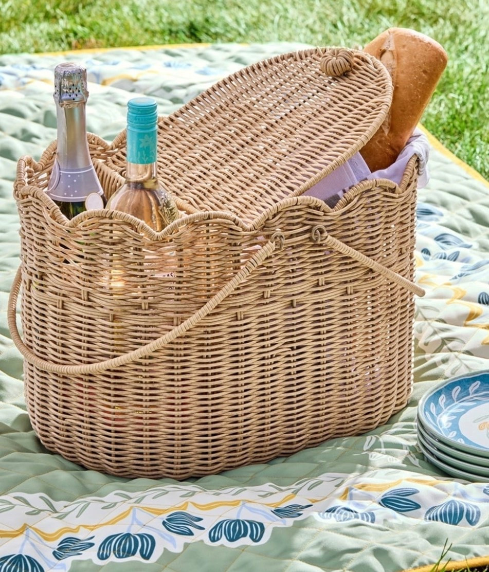 The Better Homes & Gardens Rattan Picnic Basket combines classic design with practical use. Crafted from durable resin rattan, it is lightweight yet strong. Its roomy interior holds all your picnic essentials, suitable for both outdoor and indoor activities. The design adds warmth and style, fitting various decor themes. Perfect for picnics or as a stylish storage solution

#LTKmomlife #LTKfoodie #LTKdayinmylife
