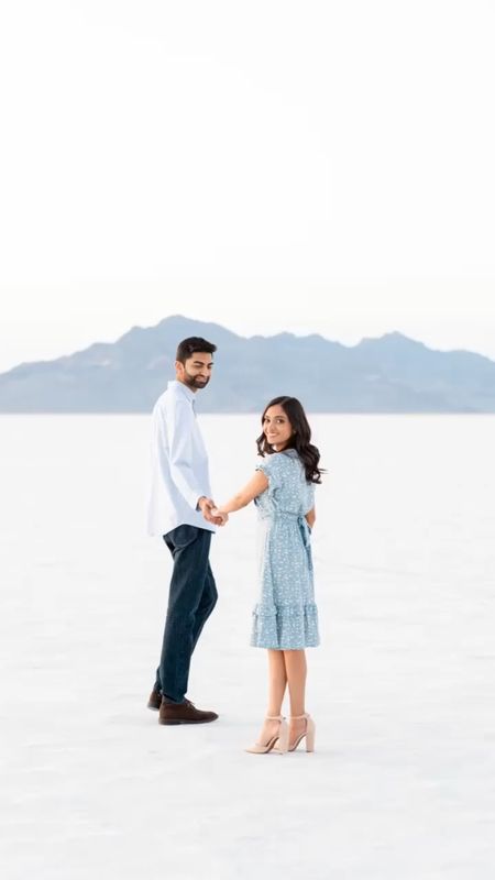 Blue engagement photos dress at the salt flats. Pearly shoes and earrings. Engaged couple wearing soft colors. Winter dreamland pictures

#LTKSeasonal #LTKshoecrush #LTKwedding