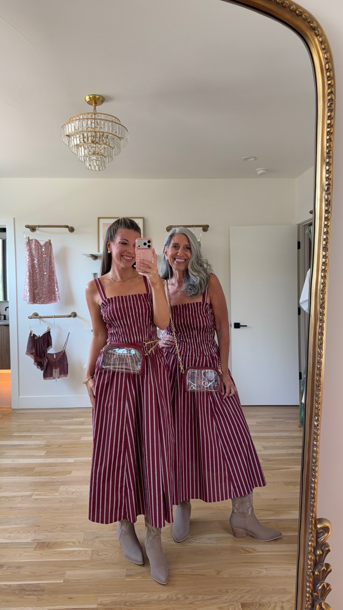 mom & me matching burgundy-and-white striped smocked-bodice maxi dresses paired with suede boots game day look for your next sporting event! 🏈 
avara code for 15% off: emerson 

i'm 5'4" and typically wear a small/2

mom is 5'4" and typically wears a medium/6

electric picks: emerson20

mom & me outfits, mom & me dresses, matching outfits, mother daughter outfits, family photo outfits, fall outfits, fall dresses, autumn outfits, midi dresses, fall dresses, casual outfits, thanksgiving outfits, family photo outfits, fall fashion, autumn fashion, cozy outfits, transitional outfits, neutral outfits, everyday outfits, weekend outfits, women’s fashion, sports, athletic, team colors, game day outfit, football outfit

#LTKgrwm #LTKSeasonal #LTKootd