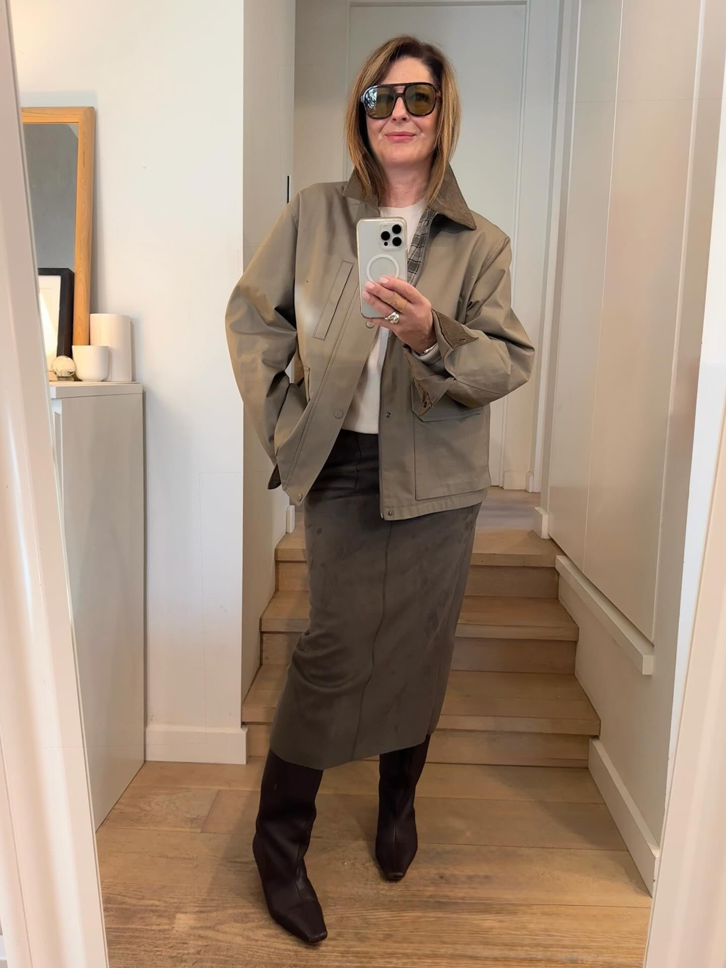 A barn jacket !
(This men’s @uniqloau , now on sale , link in stories ) You might call it a safari jacket or a field jacket. Maybe a utility jacket. I call it cool! That’s because the unstructured utilitarian shape feels new. Looks new. Looks casual yet sophisticated. Gives the air of nonchalance ( this is good!).
What’s to love ? It’s not a blazer, a crop trench or a parka. ( though it almost is!) But it works just as well. It is casual yet never boring. it’s almost a wear year round jacket:  works so well with the laid back Australian lifestyle. Totally versatile you can throw a barn jacket with a chic pencil skirt or slouchy leather pants. 

Styling tricks:

* It should have pockets, it might have a cord collar , leather trim or a funnel neck. It needs to be big !
 * Layer a lighter colour knit under the jacket ( don’t default to black !)

* Wear a barn jacket with a heel, boots, white mules/ kitten heels. The contrast of high low that makes it interesting & cool.

* A chic designer bag in brown works back with the shoes but not necessarily matches everything.

* This is men’s size large ( they call it a blouson @uniqloau ) : LOVE IT. Make sure it’s oversized and BIG , that what makes it fashiony.  Needs to make a statement. As I always say you don’t want to look like the Queen in Balmoral!

Shop my pick of the best barn jackets right here !

#LTKaustralia #LTKstyletip #LTKwinter