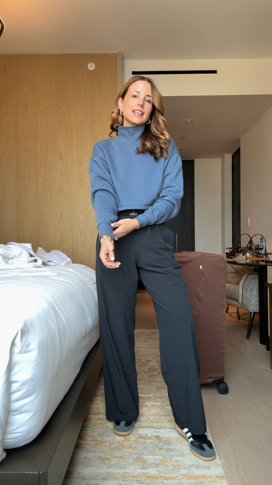 My travel outfit of the day! LOVE these Alo trouser pants in XXS in 30” inseam. I am 5’3. Alo crop sweatshirt in XXS. Adidas samba Jane run a little bit big but I did not size down because you can tighten and adjust the strap. Casual outfit. Airport outfit. 

#LTKootd #LTKTravel #LTKNYFW