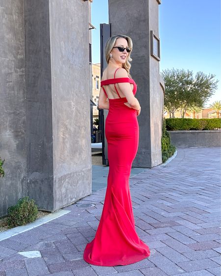 Black tie wedding guest dress, gala dress, formal gown: this red off the shoulder gown is supportive and so unique. I’m 5’2 and it didn’t need hemming. 

#LTKSeasonal #LTKHoliday #LTKwedding