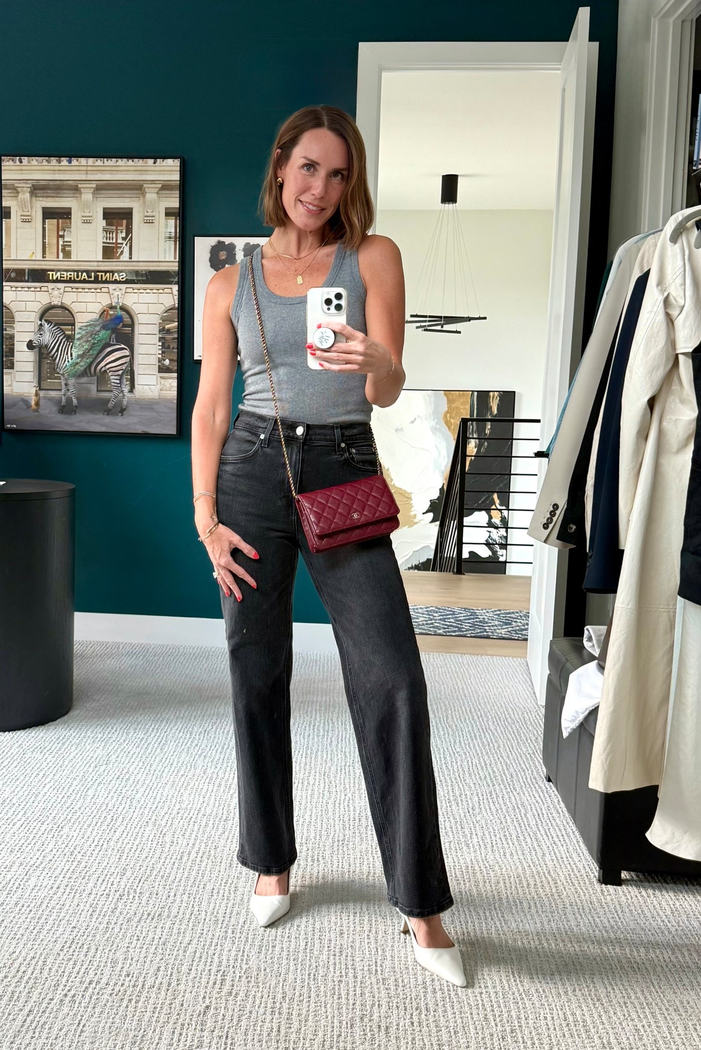 Weekend evening outfit. So simple, yet so chic. Foundation of trouser jeans and ribbed tank, then it’s all about the accessorizing. The gold jewelry, the rich burgundy bag, the pop of white sling back shoes. Elevated, effortless. 