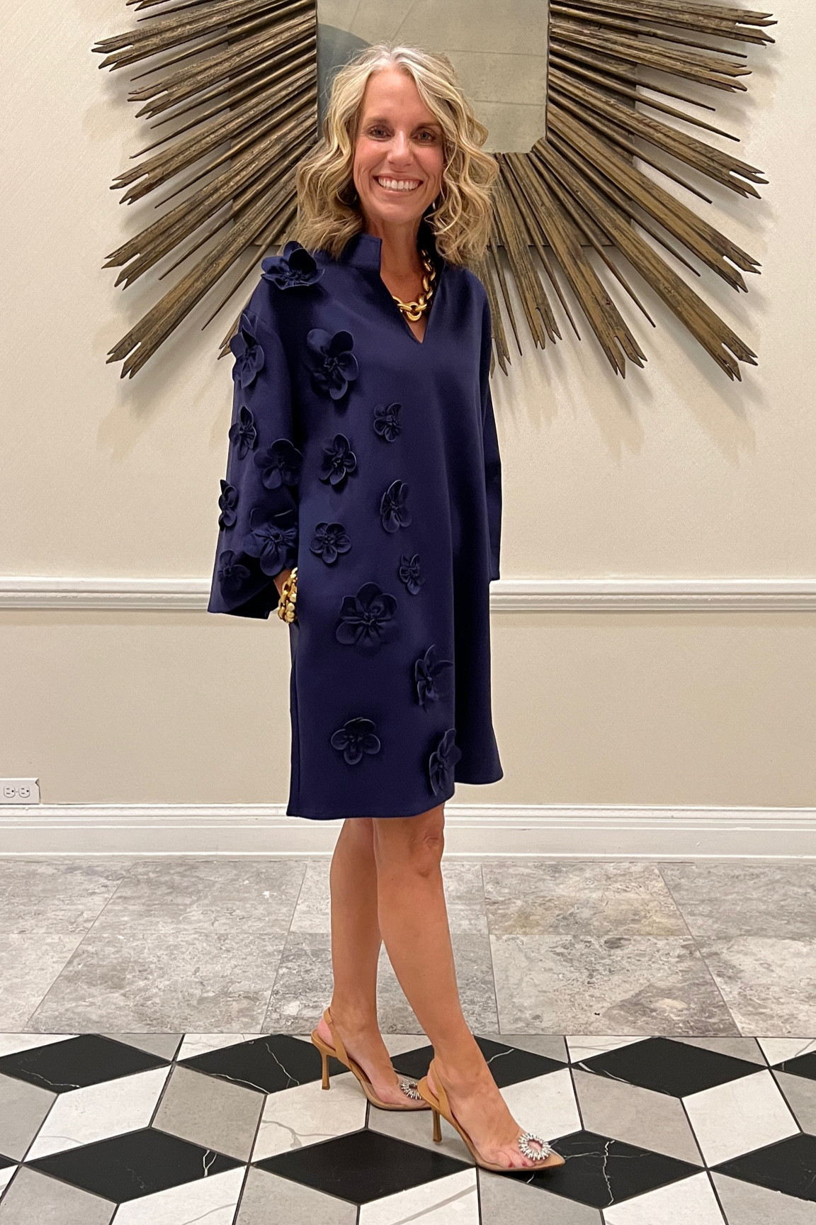 Talk about a stunner!!! This dress is one size fits most. Works best in sizes 4-12. I’m typically a 4, but it also fits my friend who’s a 12/14 

Love the fabric and appliqué detail. Wear dresses up or with sandals or sneakers for elevated casual  

#LTKworkwear #LTKover40 #LTKstyletip