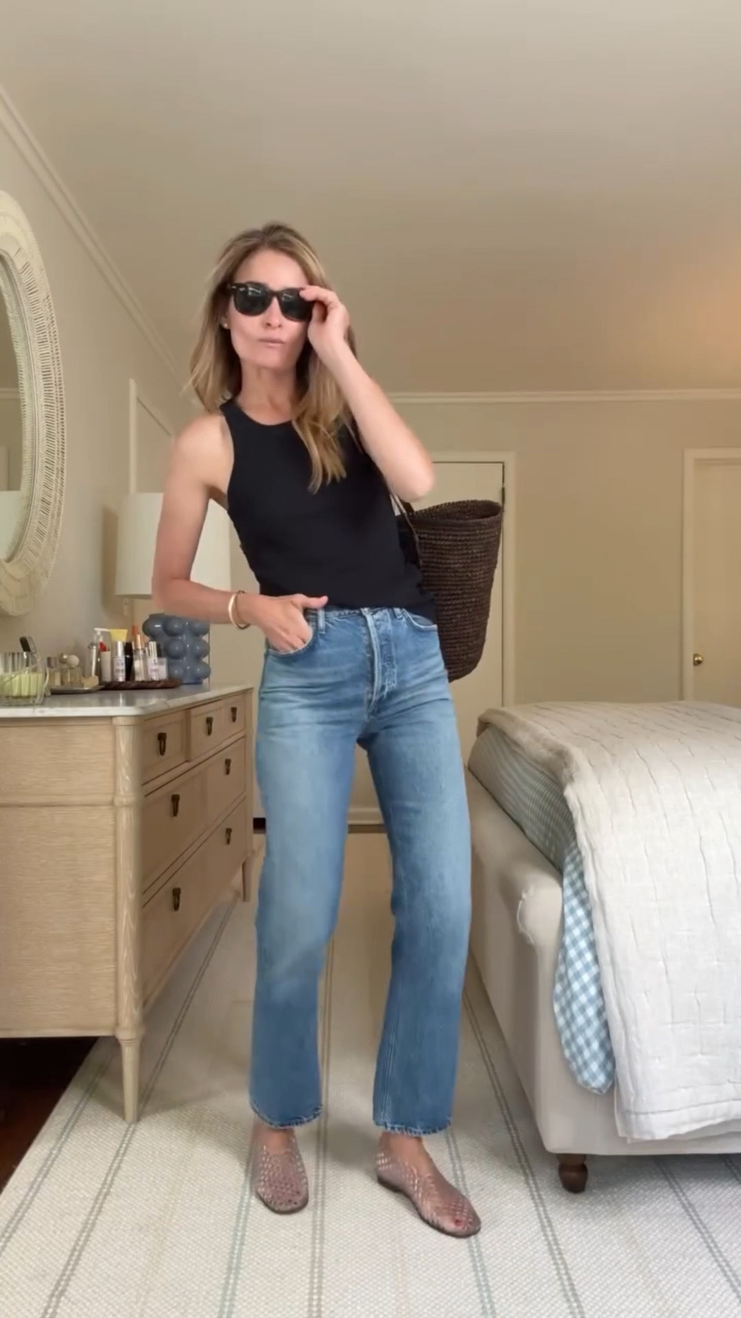 simple always wins ☕️ a great tank and straight leg jeans is something I always feel good in. The key to simplifying getting dressed is finding easy outfit formulas and sticking to them!

This tank was one I was wearing in one of my first ever ootd videos two years ago and after testing many others it’s still the one I keep coming back to because it’s just that good!! Also looks great with a midi skirt, linen shorts, thrown over a suit at the beach and just like this for an easy everyday outfit. Jeans are a year round staple that wore in every season and jellies are under $50 but look, fit and feel like the $1600 pair they are mirrored after. 

Sizing: Tank: wearing an XS, jeans: wearing tts 25, shoes: run tts in a 7, if between go up 

#ootd #everydaystyle #outfitinspiration #classicstyle #momstyle