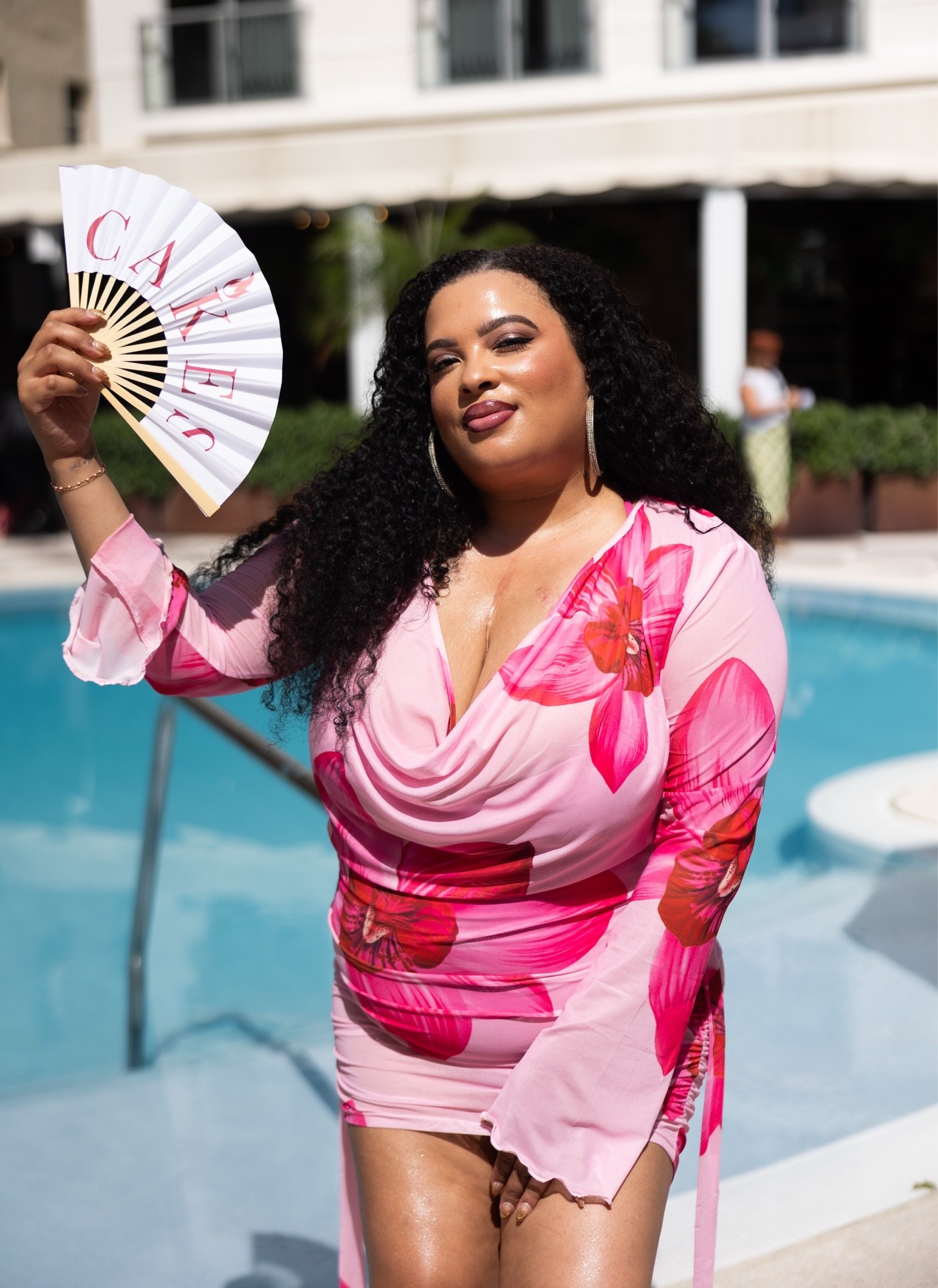 Serving major poolside elegance and soaking up the sun! I am completely obsessed with this vibrant pink floral mini dress. The beautiful cowl neckline, light long sleeves, and flattering ruched details make it the ultimate statement piece for a chic summer pool party or vacation getaway. 🌺

Pairing it with bold statement hoop earrings and a playful hand fan to stay cool while looking incredibly put together. This look is all about embracing confident, bright summer energy! ✨

#poolsidestyle #summerfashion #vacationoutfit #floralmini #resortwear #summerglam #ootdinspo

#LTKootd #LTKSeasonal