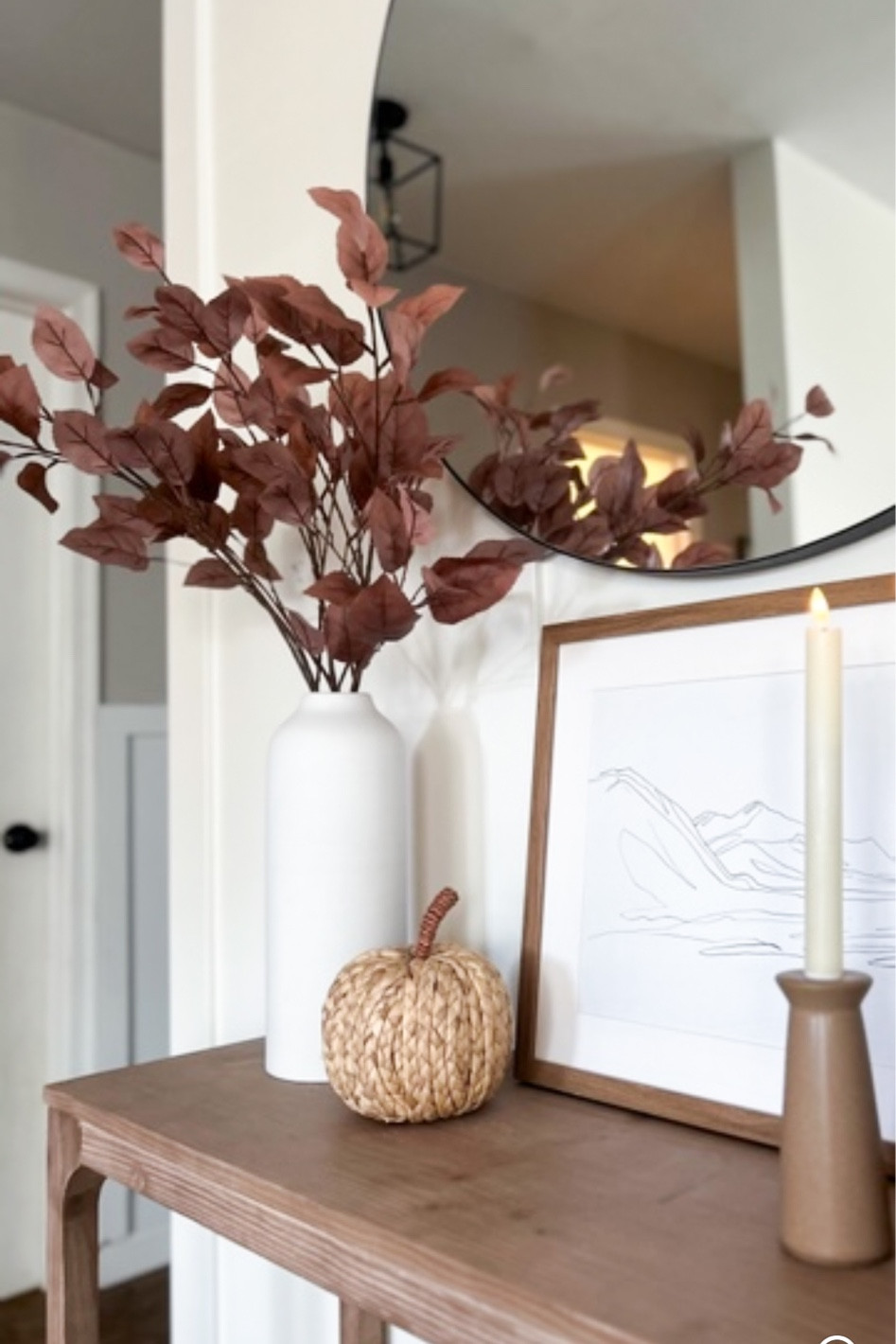 Fall console table styling 🍂

Fall stems, pumpkins, fall candles, fall entryway, console table 

#LTKHome #LTKStyleTip #LTKSeasonal