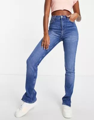 Bershka split hem straight jean in medium blue | ASOS (Global)