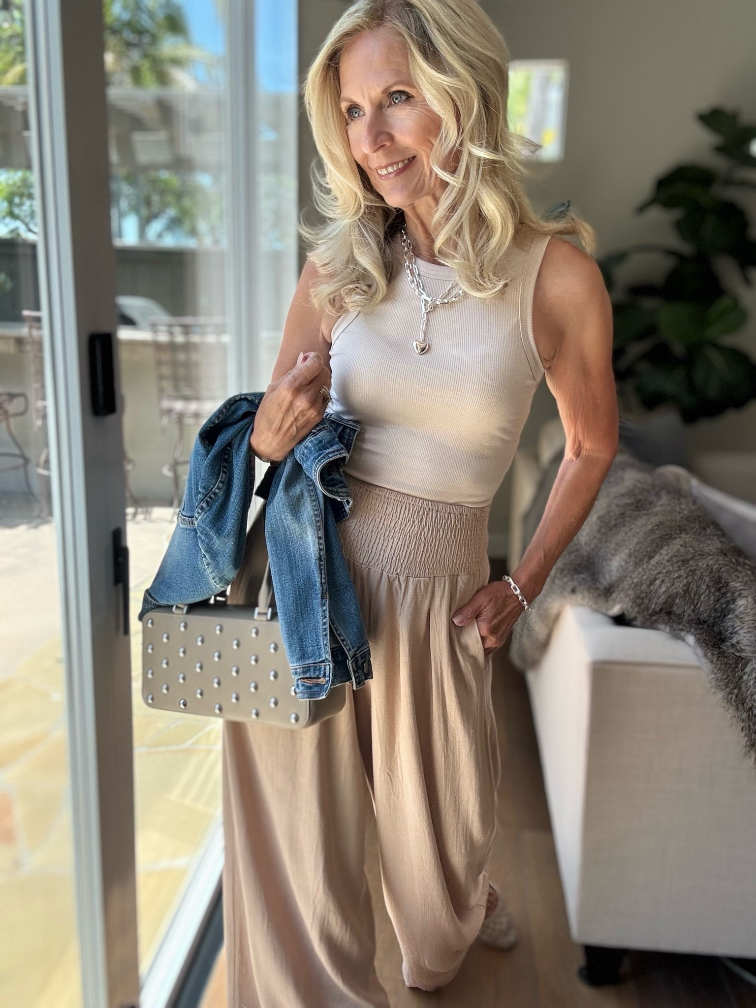How to simplify your outfit for a chic look.

Monochromatic made easy.

Wearing the same color from head to toe will give you one clean line. It’s about mixing textures that make it interesting.

These pants remind me of very similar ones I saw in Anthropologie and at a fraction of the price. I especially love the waistband and the fuller palazzo pant. Remember, full on bottom = less fabric on top with a slimmer fit.

The only color I added was my denim jacket.

Follow me for more 50+ style inspiration.

#LTKOver40 #LTKootd