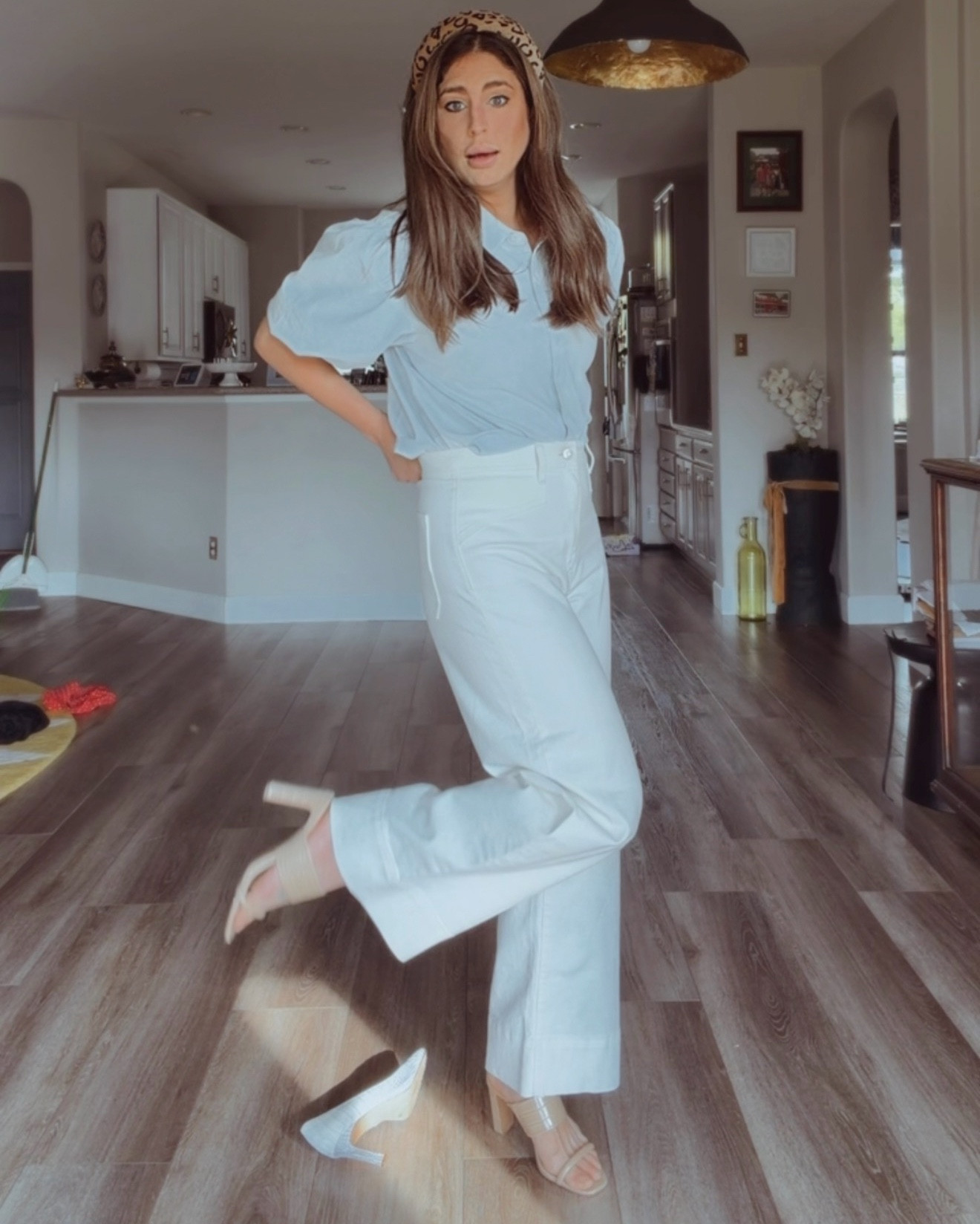 15 minutes. Full look. Conference-ready. 📢💃💼👯‍♀️
.
.
.
White wide legs because I’ve been to enough of these to know the AC is always set to “walk-in freezer.” 

Cropped blue button-up with the bubble sleeves because we’re not showing up boring. 

Tan heels that are actually comfortable because I will be standing, networking, and pretending I’m not hungry until the lunch break. 

And a cheetah headband — because it ties the whole thing together and honestly? It’s my personality in accessory form. 💁🏻‍♀️🐆

All linked on my LTK page — link in bio or DM me for the links!

#LTKgrwm #LTKdayinmylife #LTKWorkwear