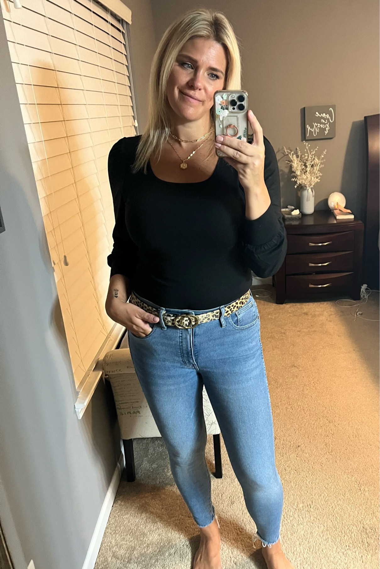 It’s starting to feel like fall outside.  I snagged this perfect black bodysuit on Amazon and paired it with a leopard belt.  Add on my favorite Madewell jeans that are currently on sale.  What kind of shoes would you wear with this? 

#LTKstyletip #LTKSale #LTKSeasonal