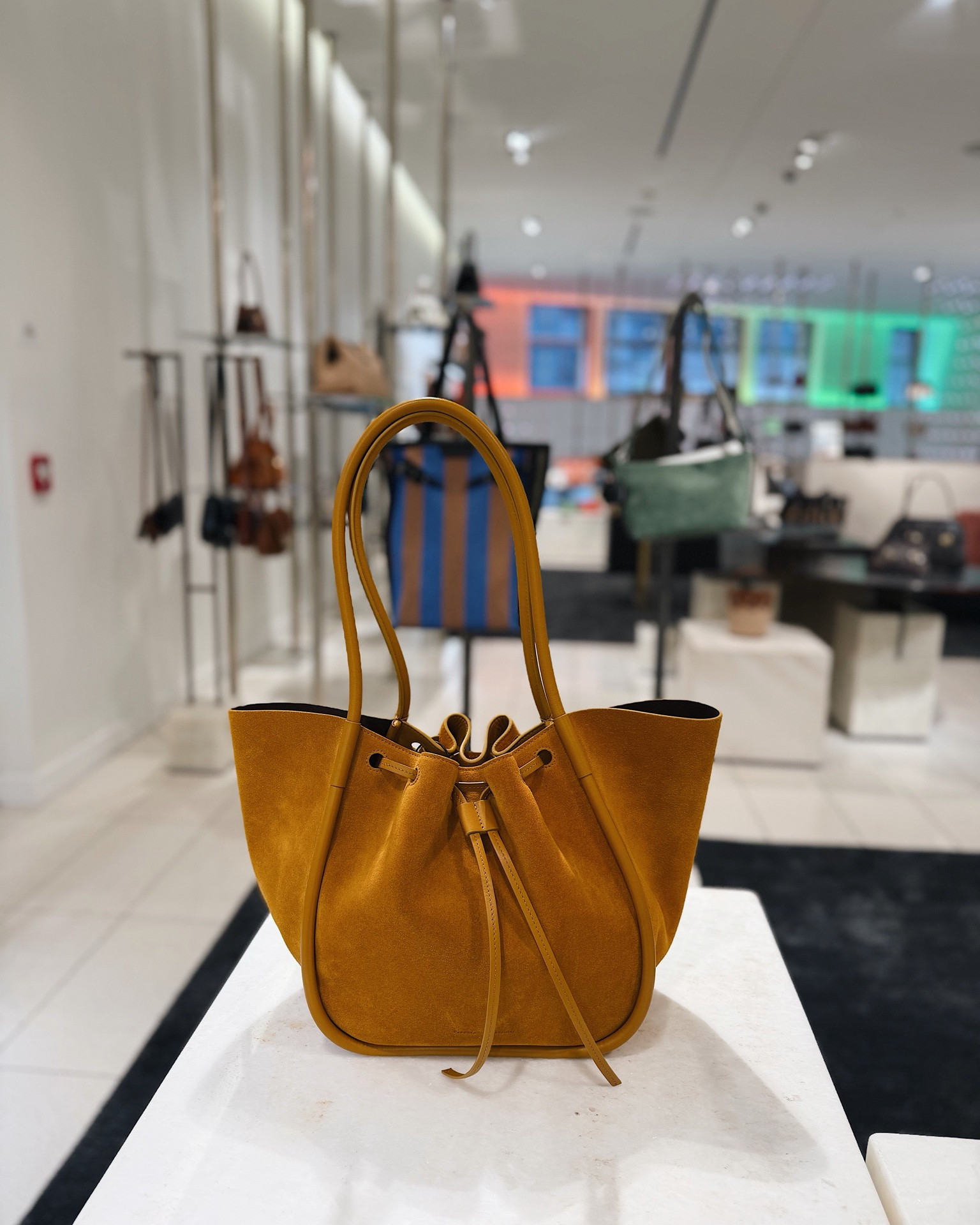 A chic suede bag for fall and a bold beaded bag for summer!