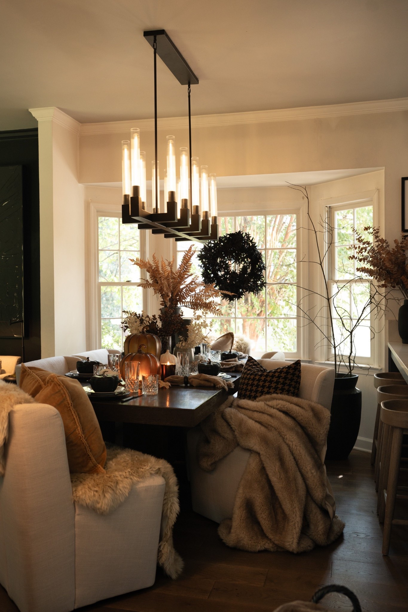 This is my DREAM fall dining space come to life! I transformed our breakfast table into a cozy, modern autumn retreat with plush throws, moody florals, and glowing candlelight. The black and amber tablespace, layered textures, and statement chandelier is absolute perfection for hosting. Every single inch feels warm, luxurious, and ready for seasonal magic. I love this season and everything that comes with it!  

 #LTKSeasonal #LTKHome #LTKStyleTip