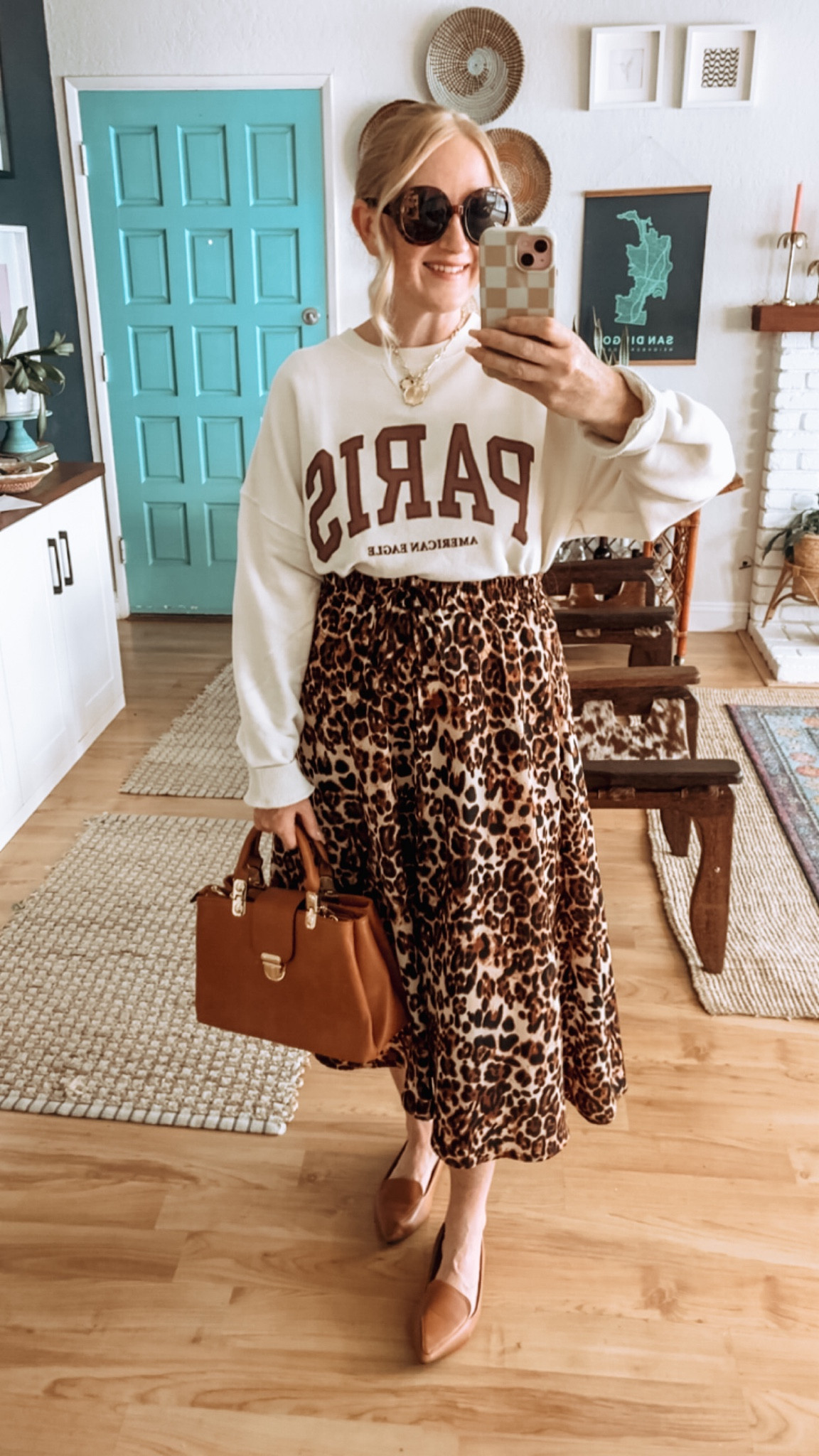 Cutest little Paris sweatshirt from American Eagle! Wearing size L. 
Skirt is old but linking similar 🐆

Fall style, fall fashion, American eagle, AE, fall haul, Paris sweatshirt, graphic sweatshirt, leopard skirt, camel mules, camel accessories, cognac shoes, cognac bag, elevated casual, target mules, loafers, target loafers, Paris graphic tee, fall transitional style 

#LTKFindsUnder50 #LTKStyleTip #LTKOver40