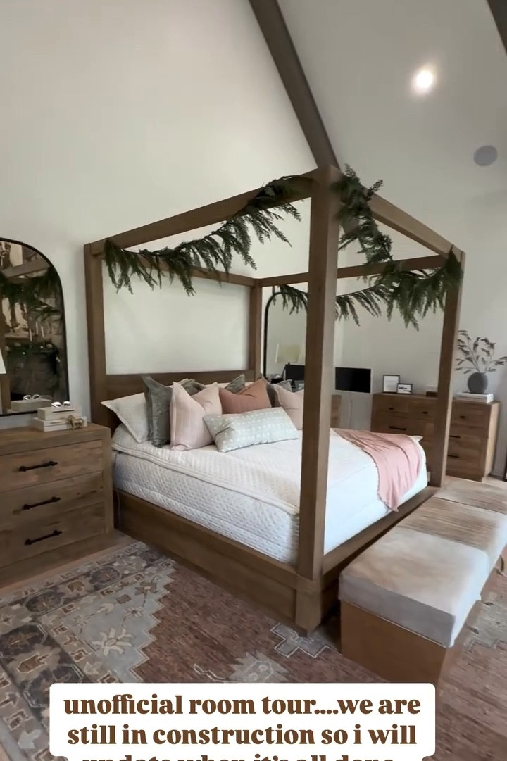 pottery barn bedroom set, arhaus rug, greenery, and pottery barn bronze arched mirrors linked! lamps and ottomans linked too! 

#LTKFamily #LTKHome #LTKSaleAlert