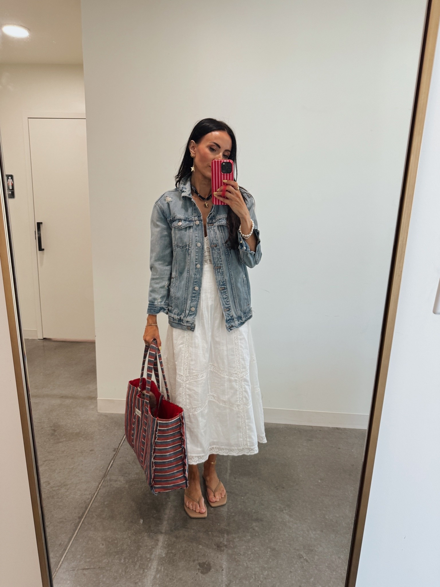 Love a little white dress and denim jacket combo. Adding a blue bandana necklace makes this look really festive and summery.