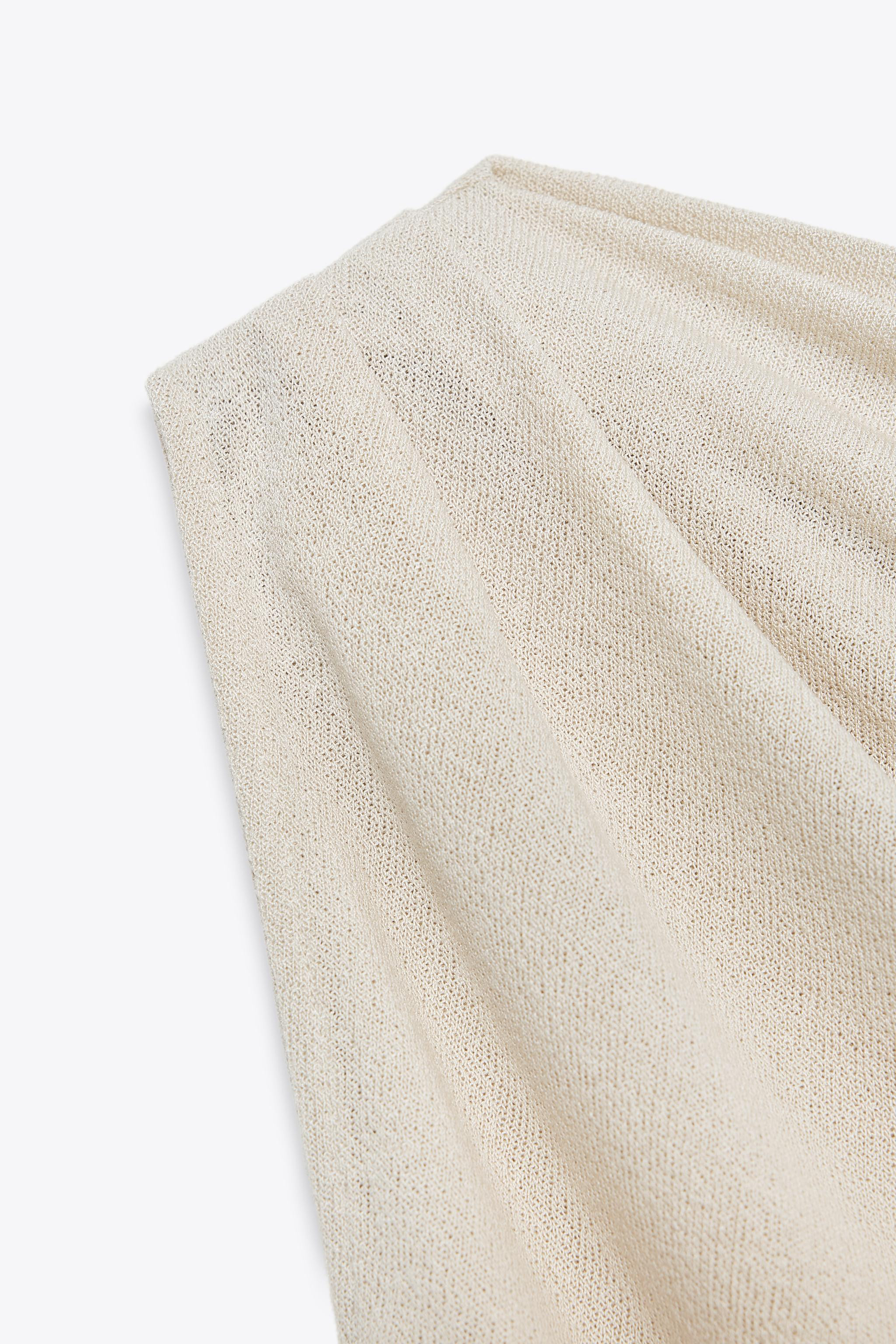 ASYMMETRIC CUT-OUT KNIT TOP | Zara US