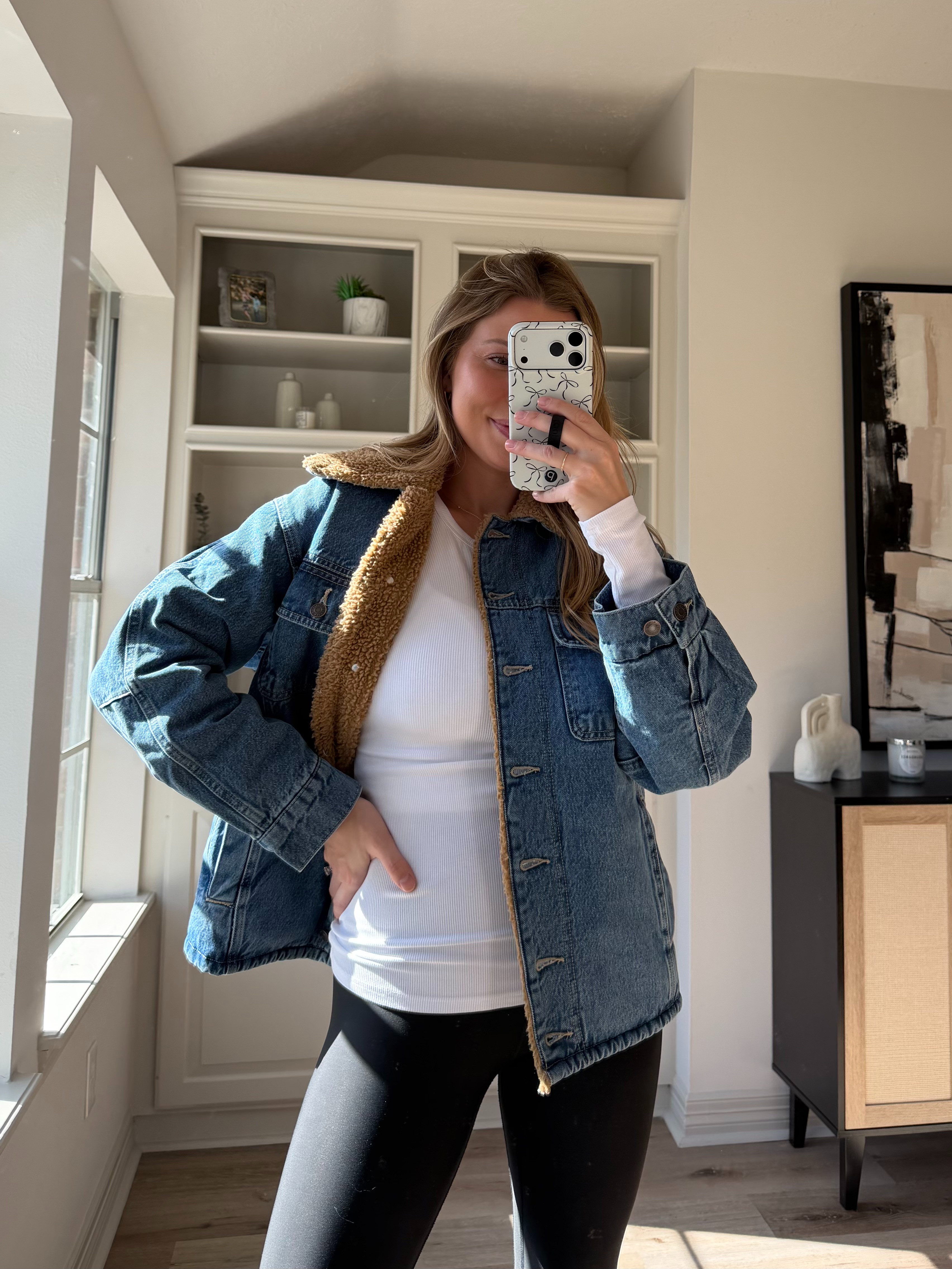 Loving this oversized sherpa denim jacket. Wearing small!  

 #LTKSeasonal #LTKFindsUnder50