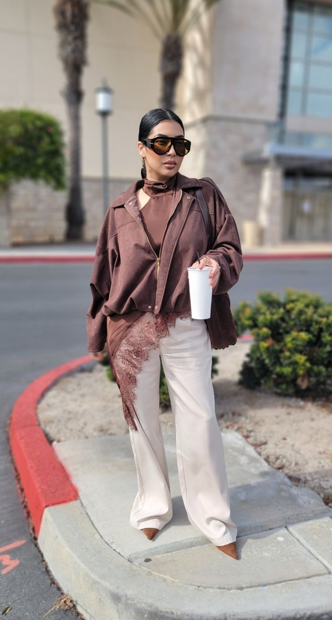 Enjoying a sunny day in this stylish outfit! Check out this suede shoulder bag, the trendy suede bomber jacket, the suede kitten heels and retro aviator sunglasses. 🕶️ Perfect for work or a day out. ● Sizes/Tallas: Jacket: S/ChikoSatin lace top: S/Chiko👖: S/Chiko👠: 7.5#ChicStyle #liketkit #outfit

#LTKootd #LTKgrwm #LTKSaleAlert