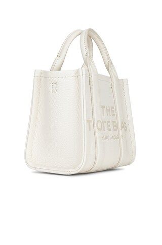 Marc Jacobs The Leather Micro Tote Bag in Cotton & Silver from Revolve.com | Revolve Clothing (Global)