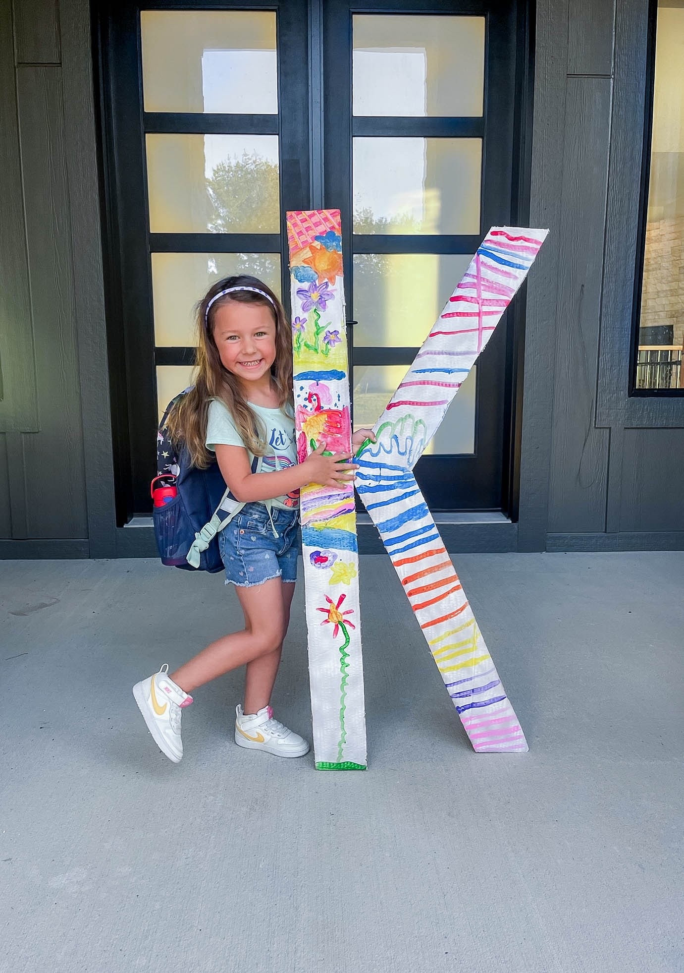 Kindergarten!

Lots of moving boxes so we cut out a “K” and she got to paint it