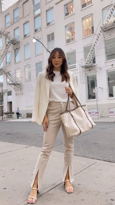 Neutral workwear outfit with split hem pants from Jing, tee from Shein and white blazer from Ann Taylor. A classy workwear look I’m neutral tones. 

#LTKunder100 #LTKstyletip #LTKworkwear