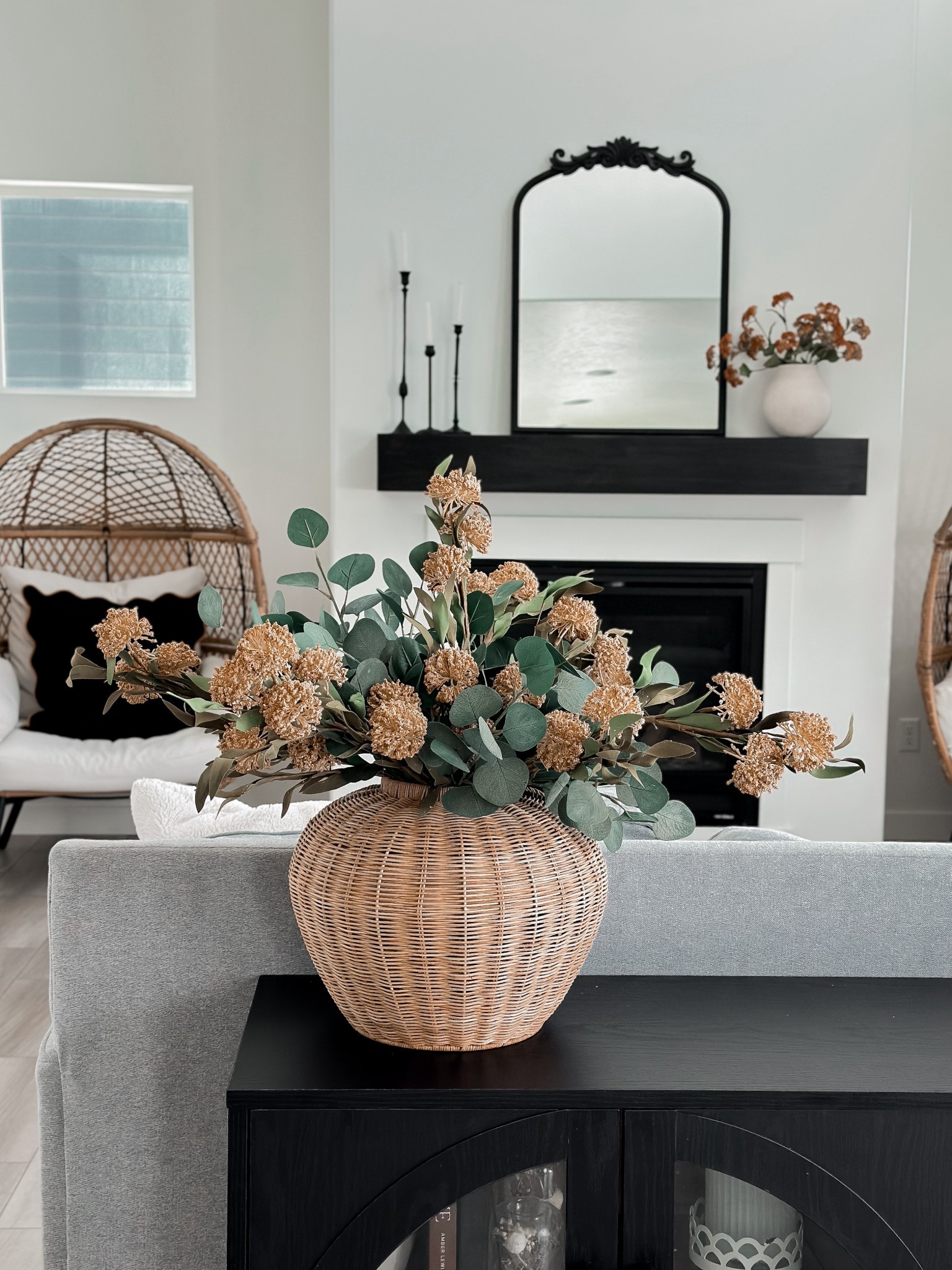 Neutral Home Vibes 🤍
Loving the cozy vibes this cabinet styling refresh is bringing with my favorite rattan vase, faux greenery, and neutral fall florals. This mix of boho and modern farmhouse decor is perfect for transitioning from summer to fall! 🍂✨

Shop my entryway decor, mantel styling, and living room finds below. I’ve linked similar woven baskets, wood + black accents, and budget-friendly faux stems to help you get the look.

Key Style Words: #homedecor #ltkhome #neutralhome #bohodecor #modernfarmhouse #targetstyle #amazonhome #ltkfinds #coffeetabledecor #manteldecor #interiordesign #homestyling #rattanvase #fauxgreenery #fallhomedecor



#LTKHome #LTKFindsUnder50 #LTKStyleTip