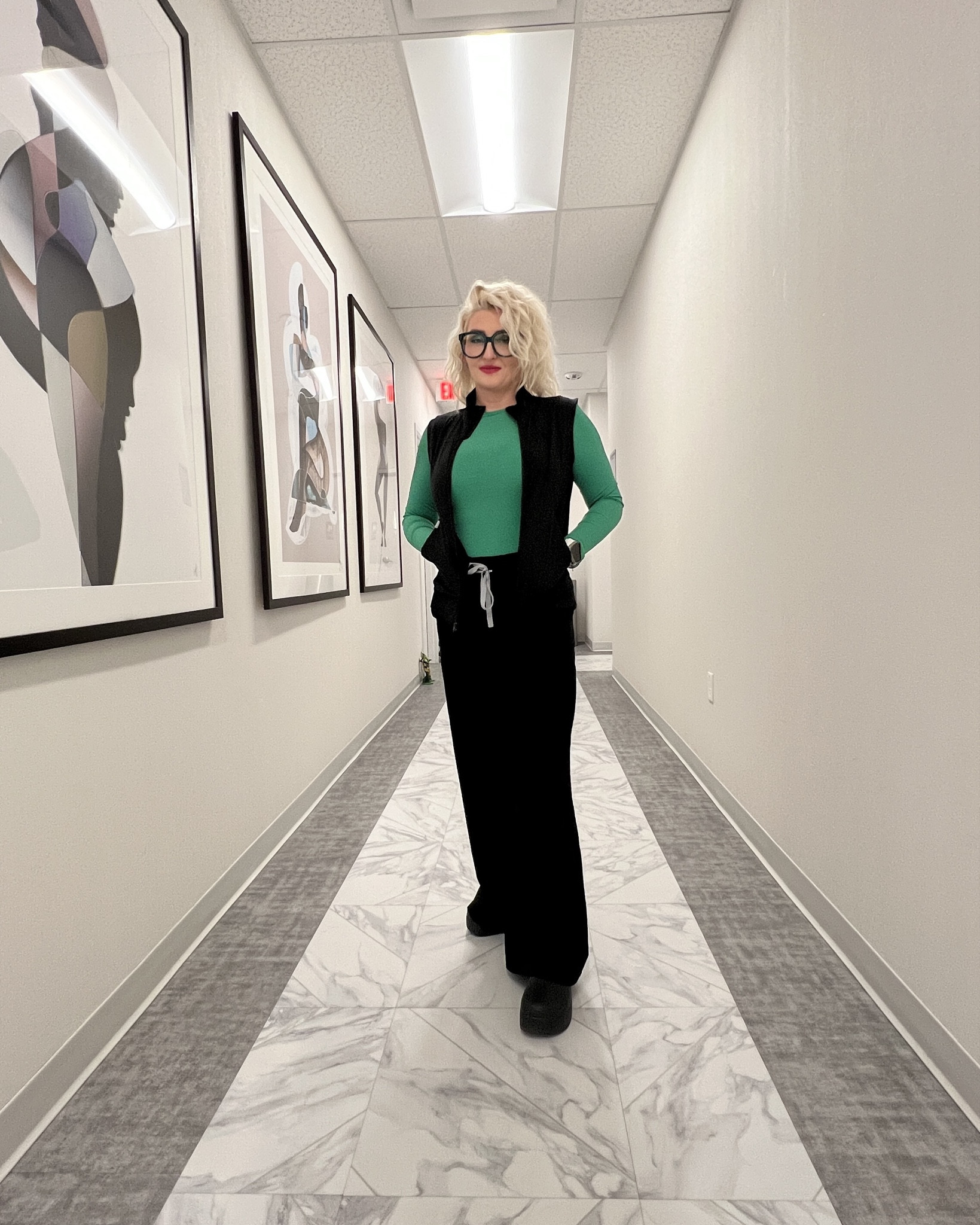 The green top that instantly makes basic black scrubs look more styled. Easy, comfortable, and one of those pieces that gets noticed every time.