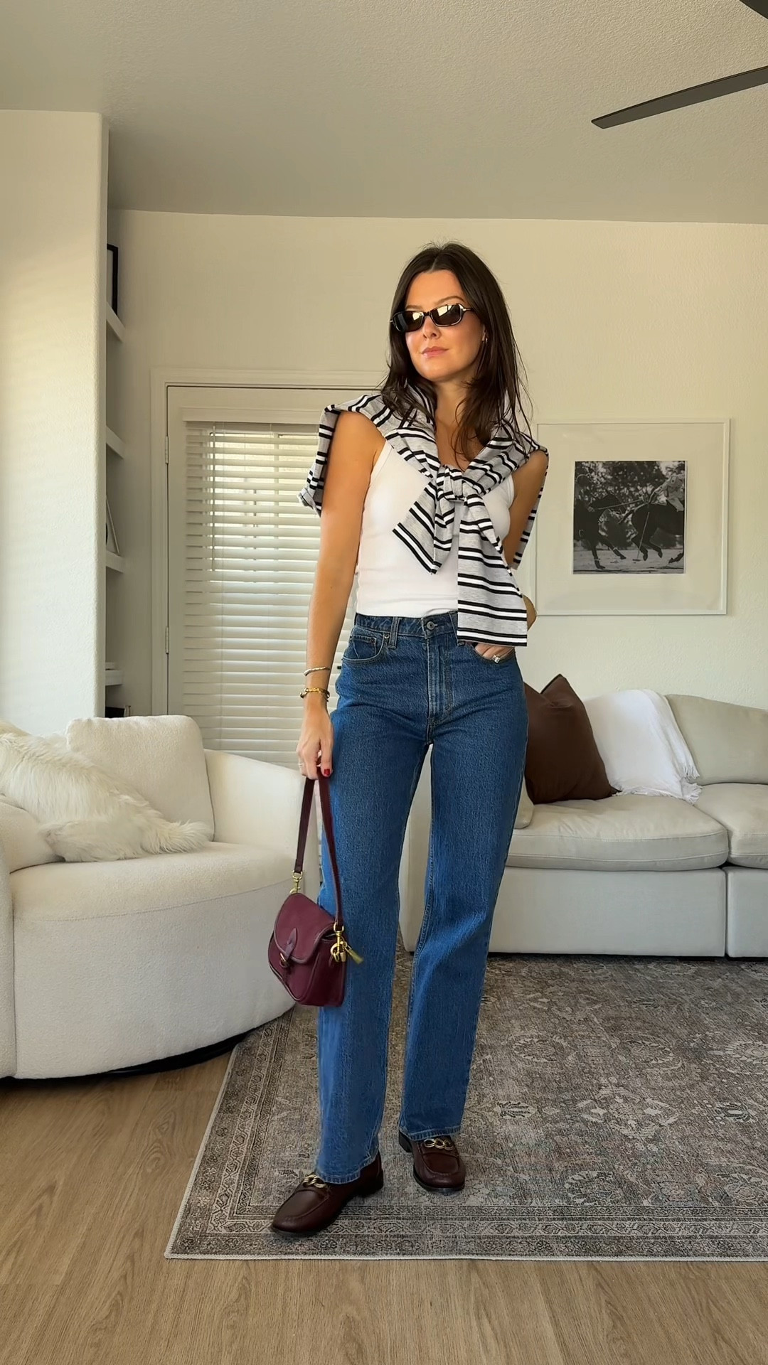 Outfit inspo of the day! This is a great outfit for the summer to fall transition, I’m 5’7” wearing a size small in the rugby/striped shirt and white tank top, and true size 25 in the jeans. Use code DENIMAF at abercrombie until 8/11/2025 for an extra 15%  

#LTKSeasonal #LTKStyleTip #LTKFindsUnder100