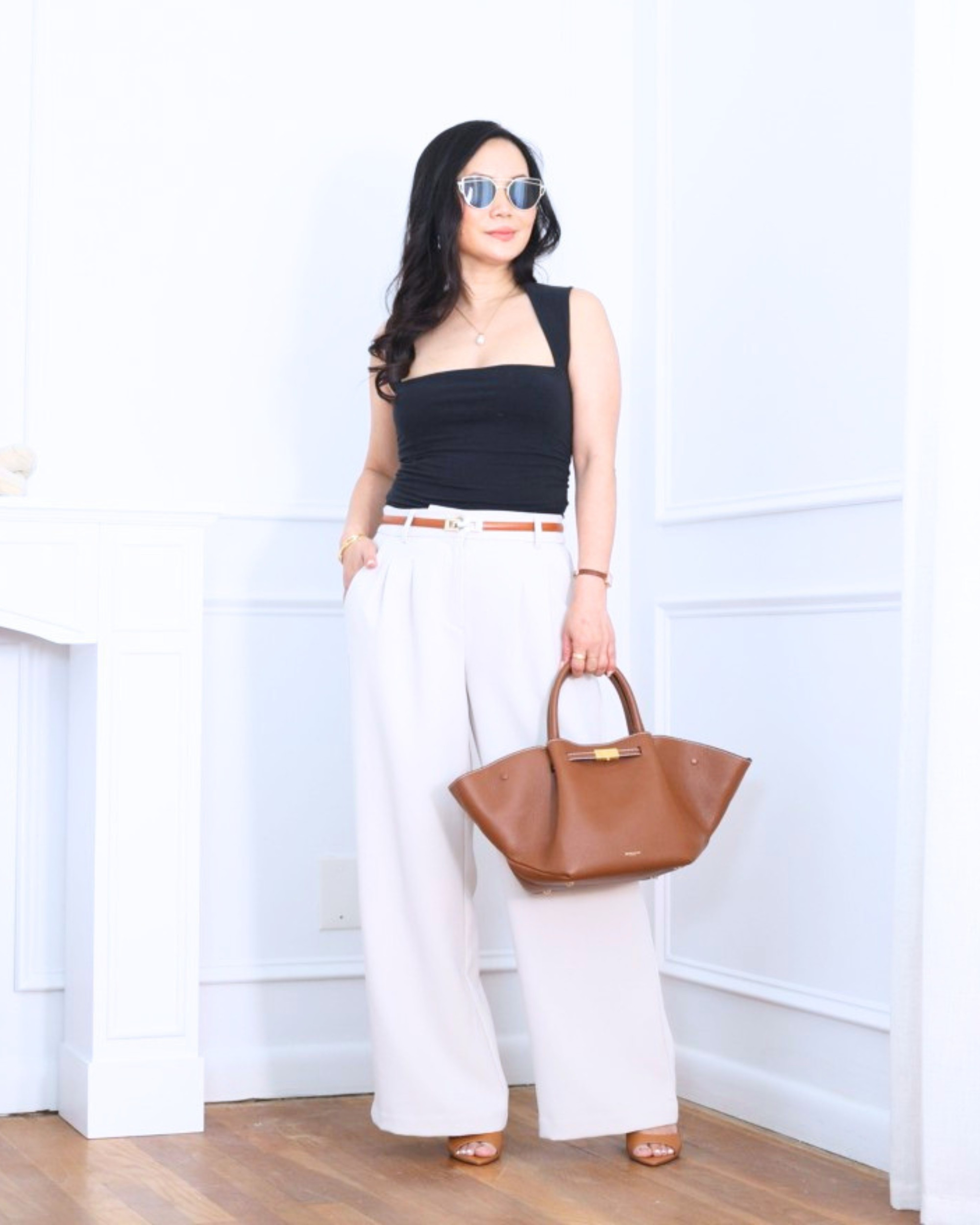 Ava black top from Abercrombie paired with palazzo pants from LOFT and shoes from Mango — sleek, flattering, and effortlessly polished for an easy elevated look. I'm 5'2, wearing size XS. 

 #LTKootd #LTKOver40 #LTKPetite