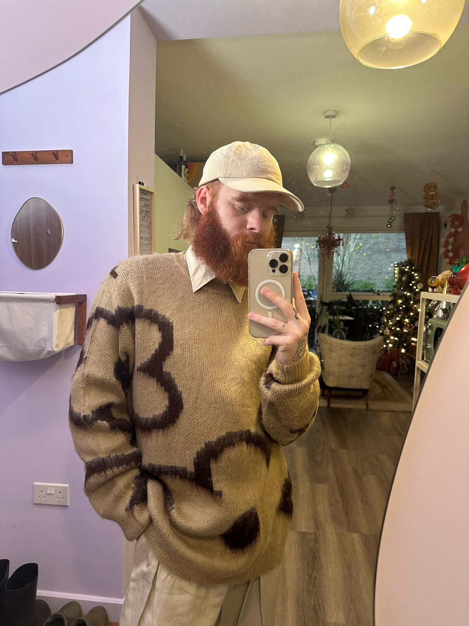 Brown floral jumper, cream hap, asos 

#LTKeurope #LTKstyletip #LTKSeasonal