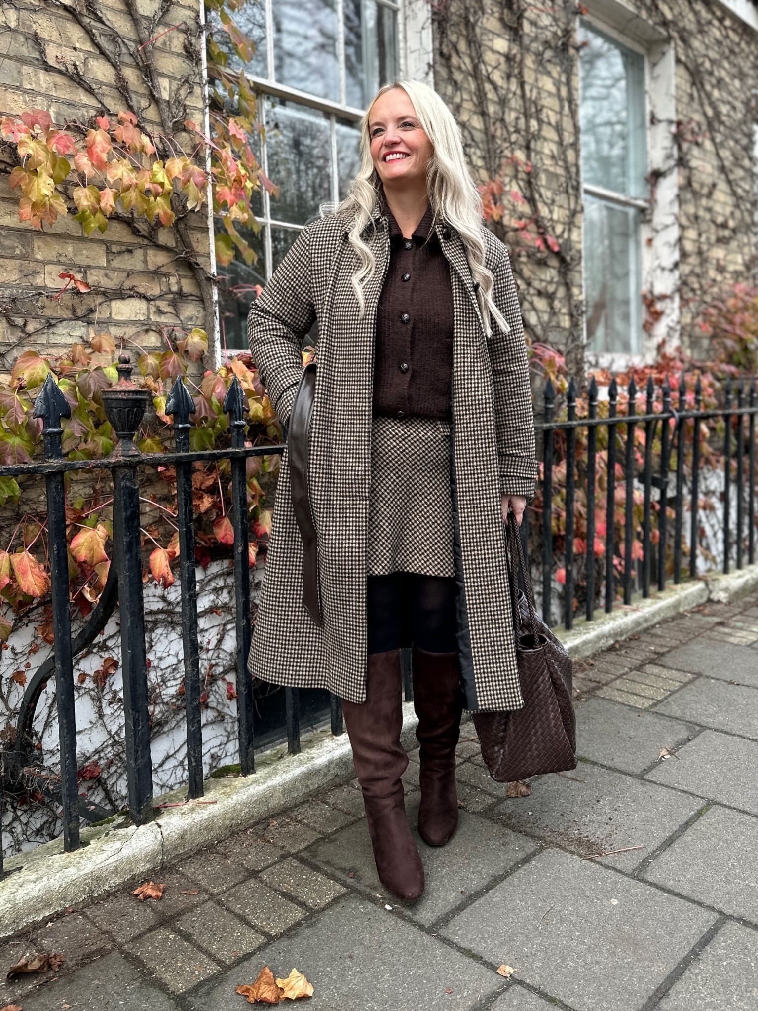🖤The @newlook Black Friday sale is now on with up to 40% off 1000’s of styles🖤 
I’m dressed head to toe in New Look here wearing the Brown Checked Belted Longline Coat (also comes in tall and petite) with matching Brown Check Pattern A-line Mini Skirt. Underneath I have on the Brown Ribbed Knit Collared Button Through Cardigan and my boots are the Brown Faux Suede Knee High Boots.

#LTKautumn #LTKCyberWeek #LTKuk