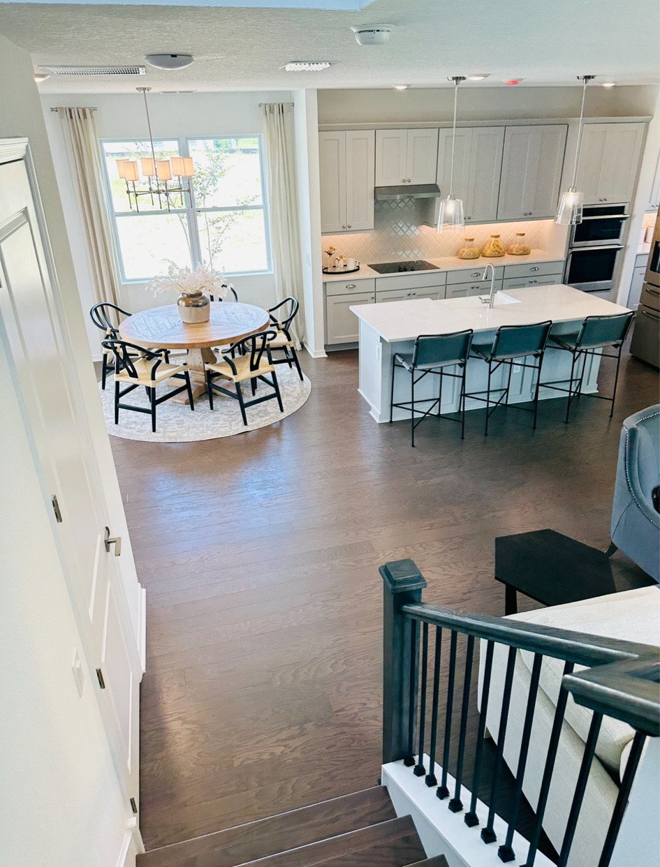 Create Separation in your open floor plan with this Eat-in Kitchen Design with round table and chairs.  Add additional seating with bar stools.

#LTKhome