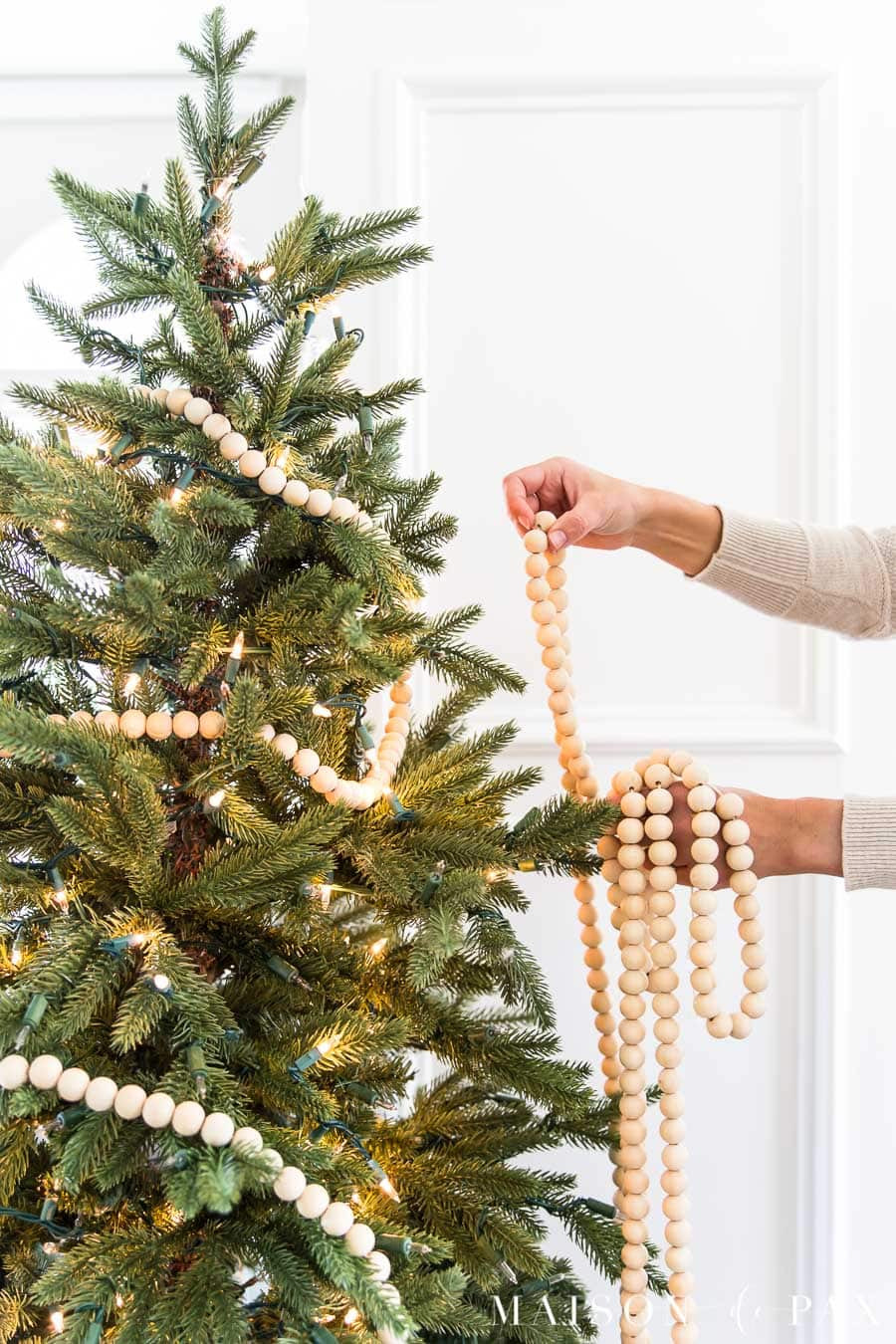 Love a cozy, minimalist Christmas look? This DIY wood bead garland adds the perfect touch of warmth and texture—so easy to make and reuse year after year! 🤍 

 #LTKHome