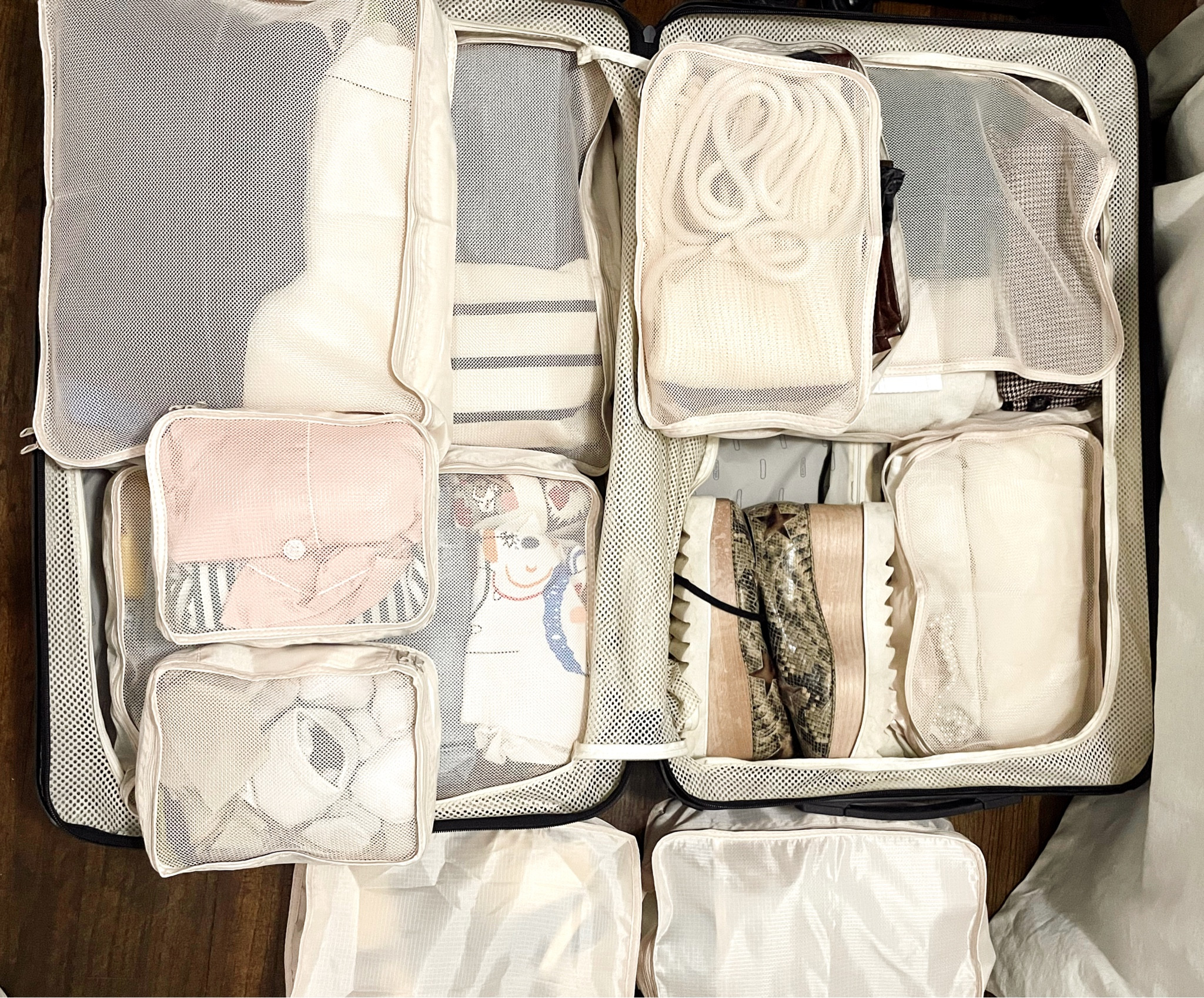 Traveling has never been so organized and easy. I don’t know why I’m just now on the packing cube train but wow I’ve been missing out. This makes international travel especially easy when you’re hopping around from spot to spot and don’t want to unpack your entire bag at each destination. Just grab the designated cube for each place!
*I ordered 2 sets and both fit perfectly in my large checked bag. 

#LTKeurope #LTKtravel #LTKstyletip