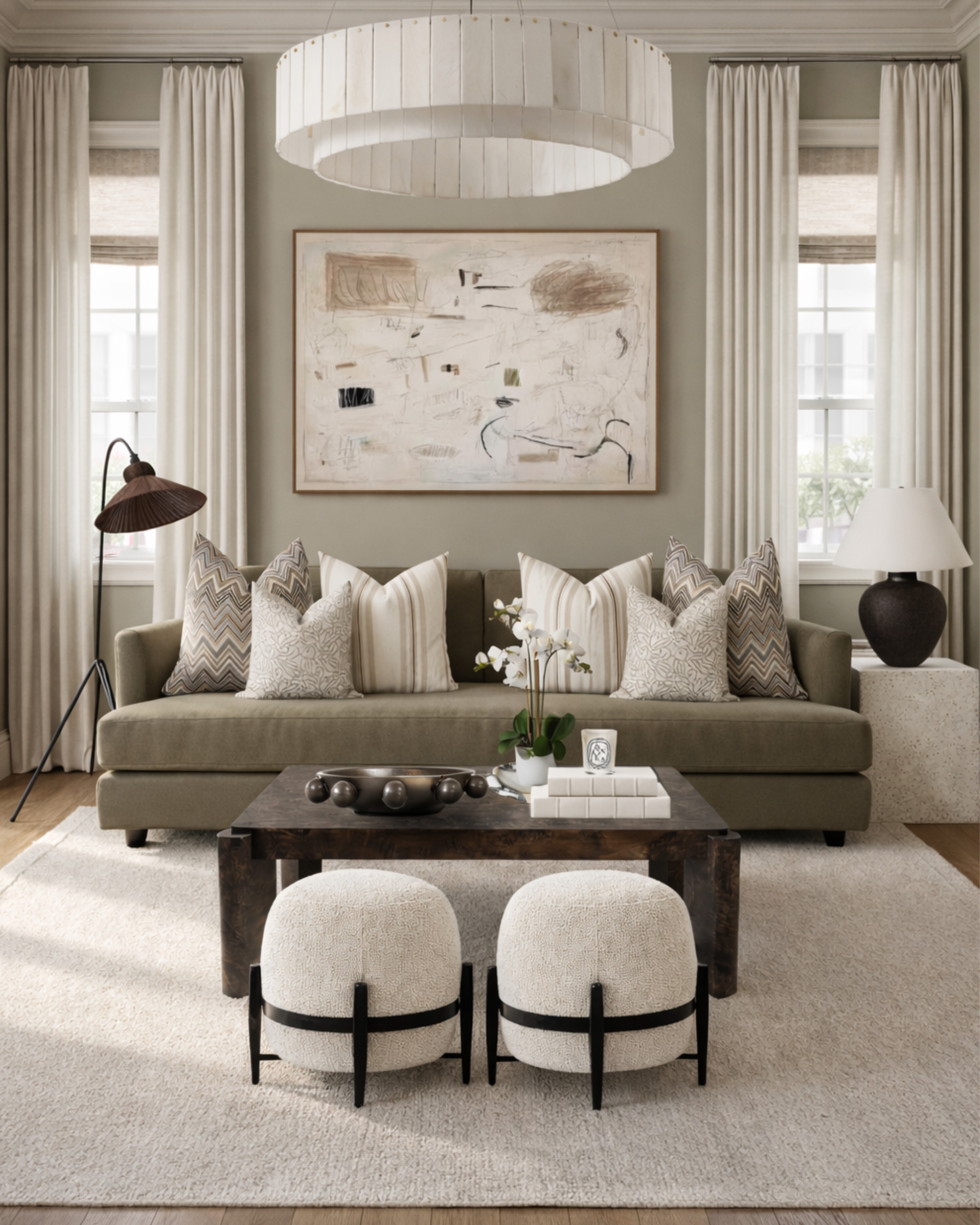This is how you make a neutral space feel layered—not flat.

Nothing here is overly bold, but the mix of tones, textures, and subtle contrast is doing all the work. The warm wood, soft upholstery, and tonal pillows keep everything cohesive while still giving your eye somewhere to land.

It’s proof that you don’t need color to create depth—you just need variation in the right places.

If your living room feels a little one-note, start here: texture, contrast, and balance over more “stuff.” 

 #LTKHome