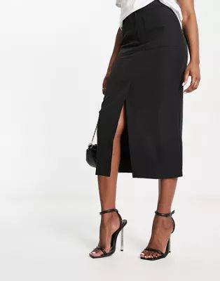 ASOS DESIGN clean midi pencil skirt with pocket detail in black | ASOS (Global)