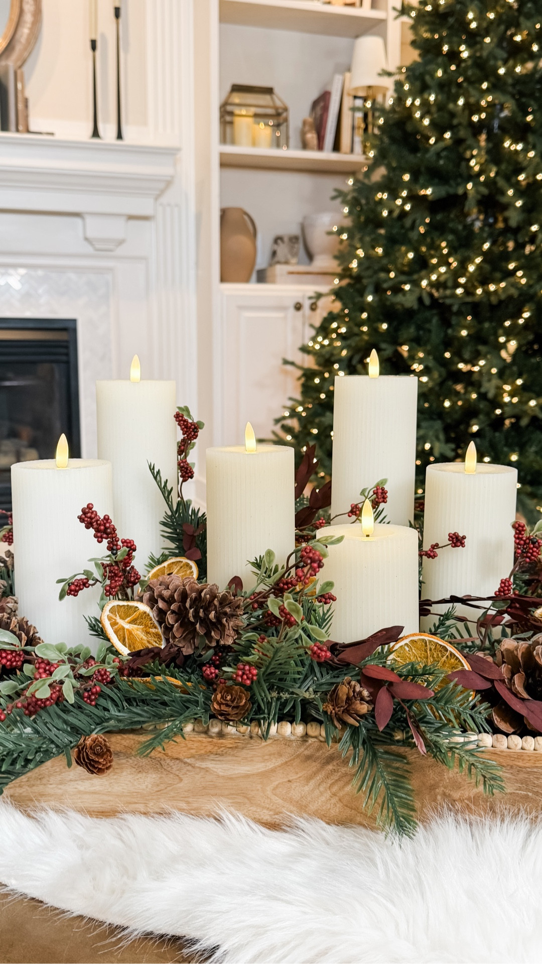 Classic Christmas Candle Garden 🌲 Just simple layers that feel like Christmas — a mix of evergreens, pinecones, berries, and dried oranges with a little candlelight glow. Whether faux or foraged, it’s cozy, natural, and so easy to pull together.

Create a festive moment on your coffee table, kitchen island or dining table.

#Followmeonltk

#LTKSeasonal #LTKHome #LTKHoliday