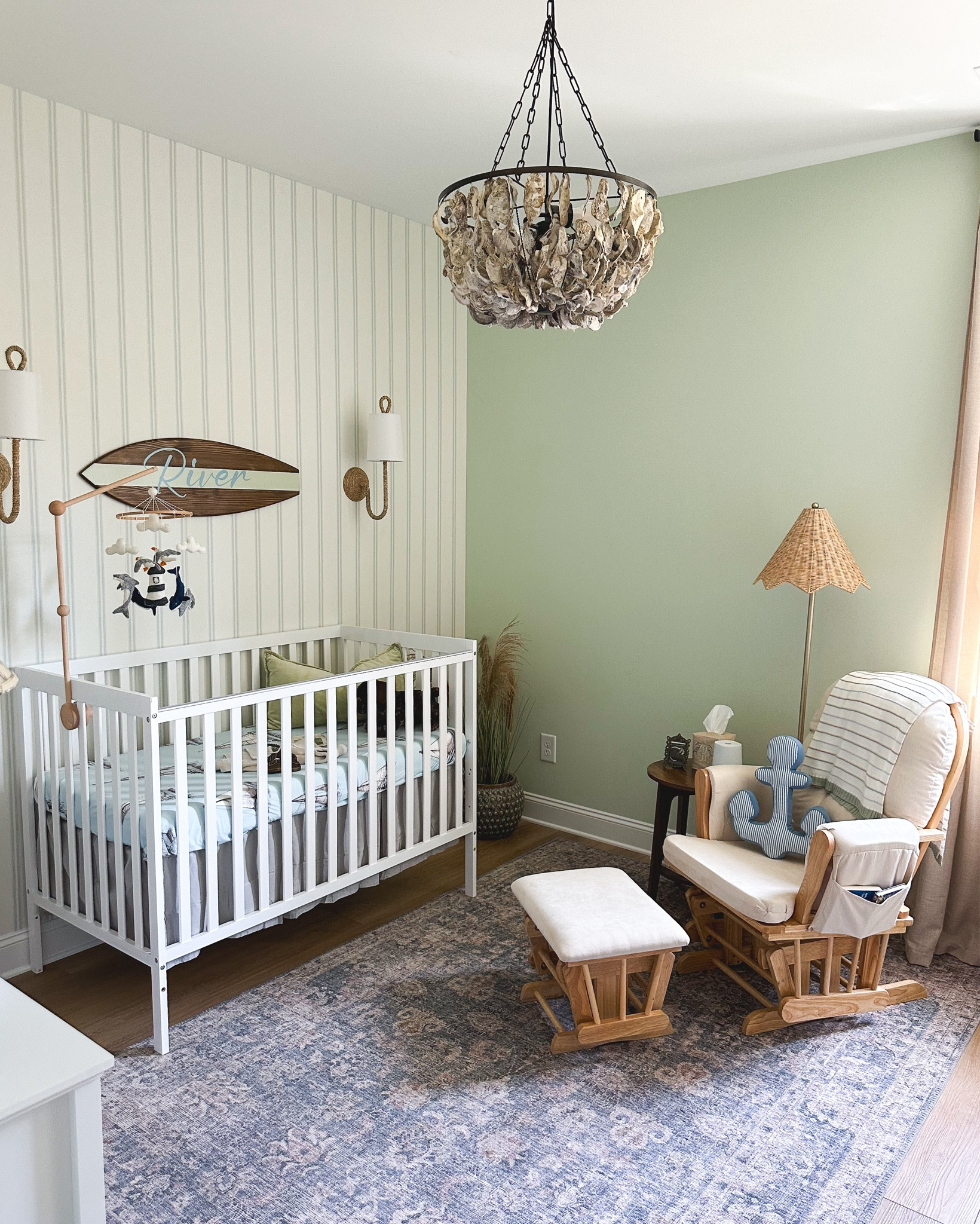 Nursery Reveal 💙🌊🦪🫶👶🏻🌾
Nearly 8 years ago Mom & Dad began their yearly vacations to the Carolinas. It was there that they completely fell in love with the lush, gorgeous & quaint, low country marsh nature that the Carolinas had to offer. Flash forward to now - we live in North Carolina where our little guy will be born & raised & we can wake up daily & show him the beautiful low country marsh land we fell in love with & hope he loves it just as much we do!  When it came to this nursery design - we wanted it to feel like every morning you’re waking up on the marsh with design elements incorporating coastal Carolina in full respect. We cannot wait to raise our little guy in this beautiful place we get to call home! 🩵🌾🌊⛵️🦪 

#LTKBaby #LTKHome #LTKKids