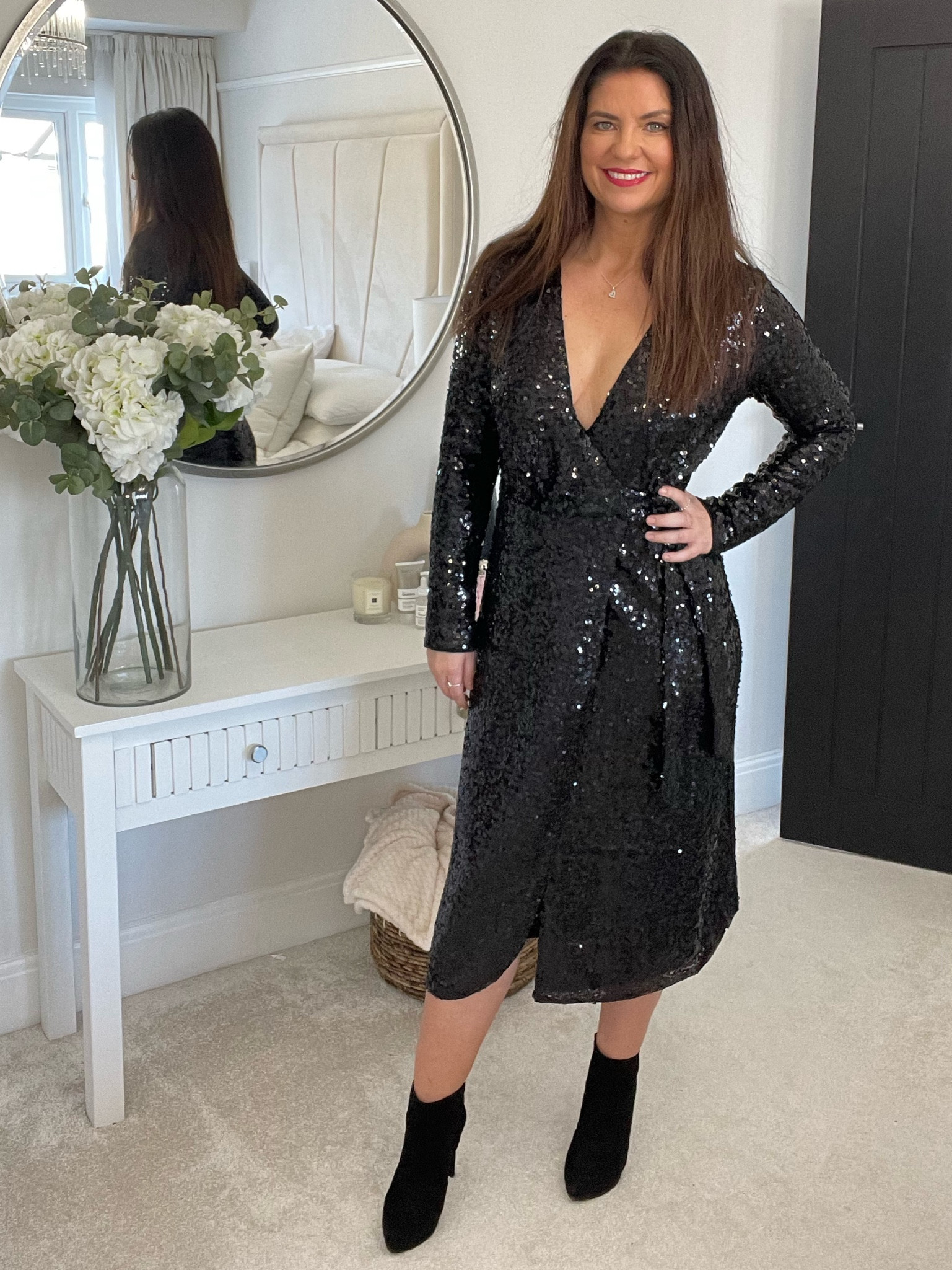 Party time with this luxe sequin wrap dress. It looks way more expensive than it actually is. It’s a showstopper!

Calf-length, long-sleeved dress in sequined mesh with a V-shaped neckline, a wrapover front with an elasticated seam at the waist, ties at one side and a concealed hook-and-eye fastener at the other. Lined.

#LTKunder50 #LTKstyletip #LTKSeasonal