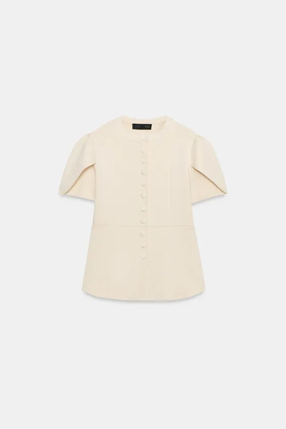 DescriptionColourCompositionMeasurementsFitted cardigan with a round neck and short puff sleeves ... | Zara UK