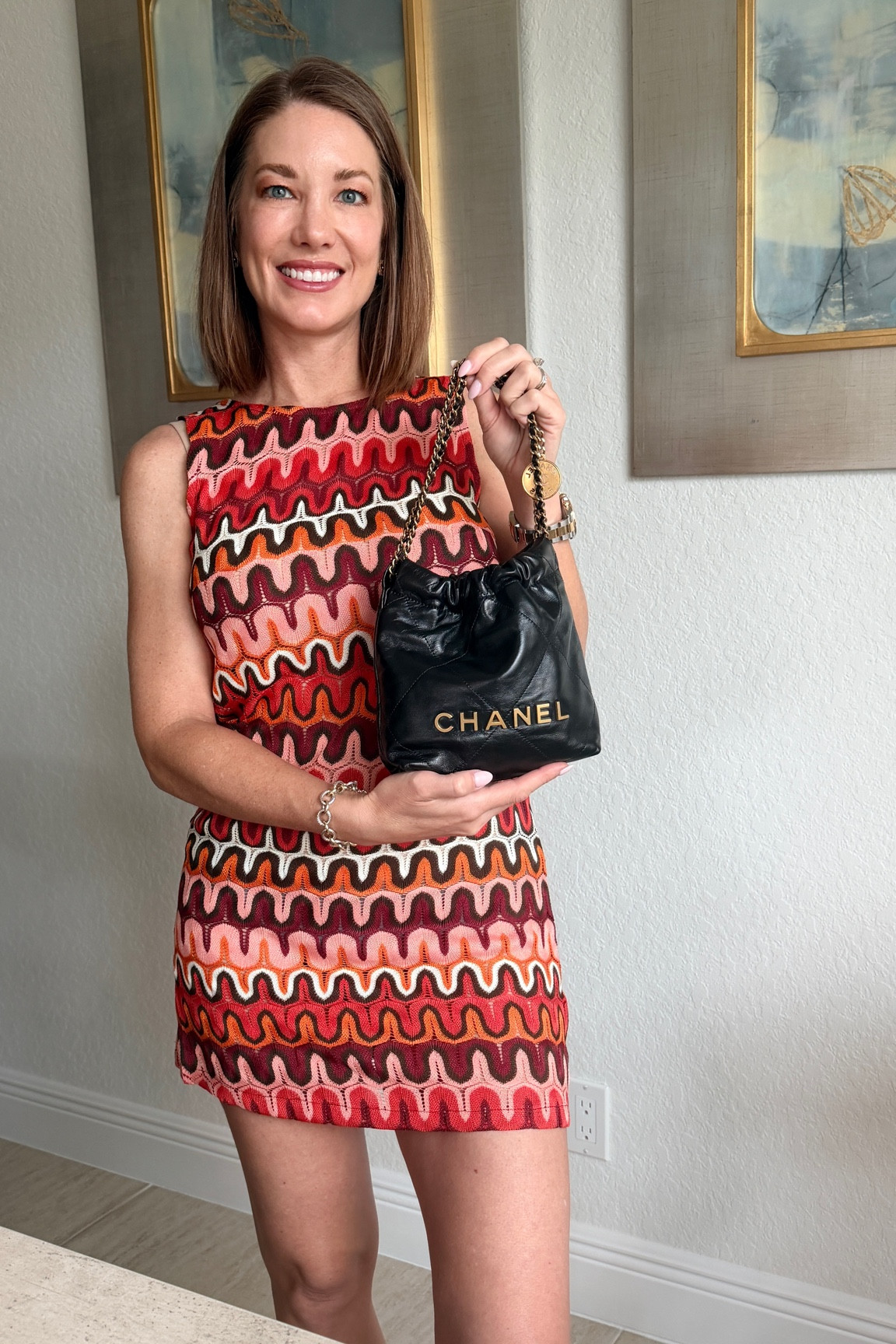 A fun summer dress and my favorite little Chanel bag! The Chanel 22 #ootd #chanel22 #summerdresses
