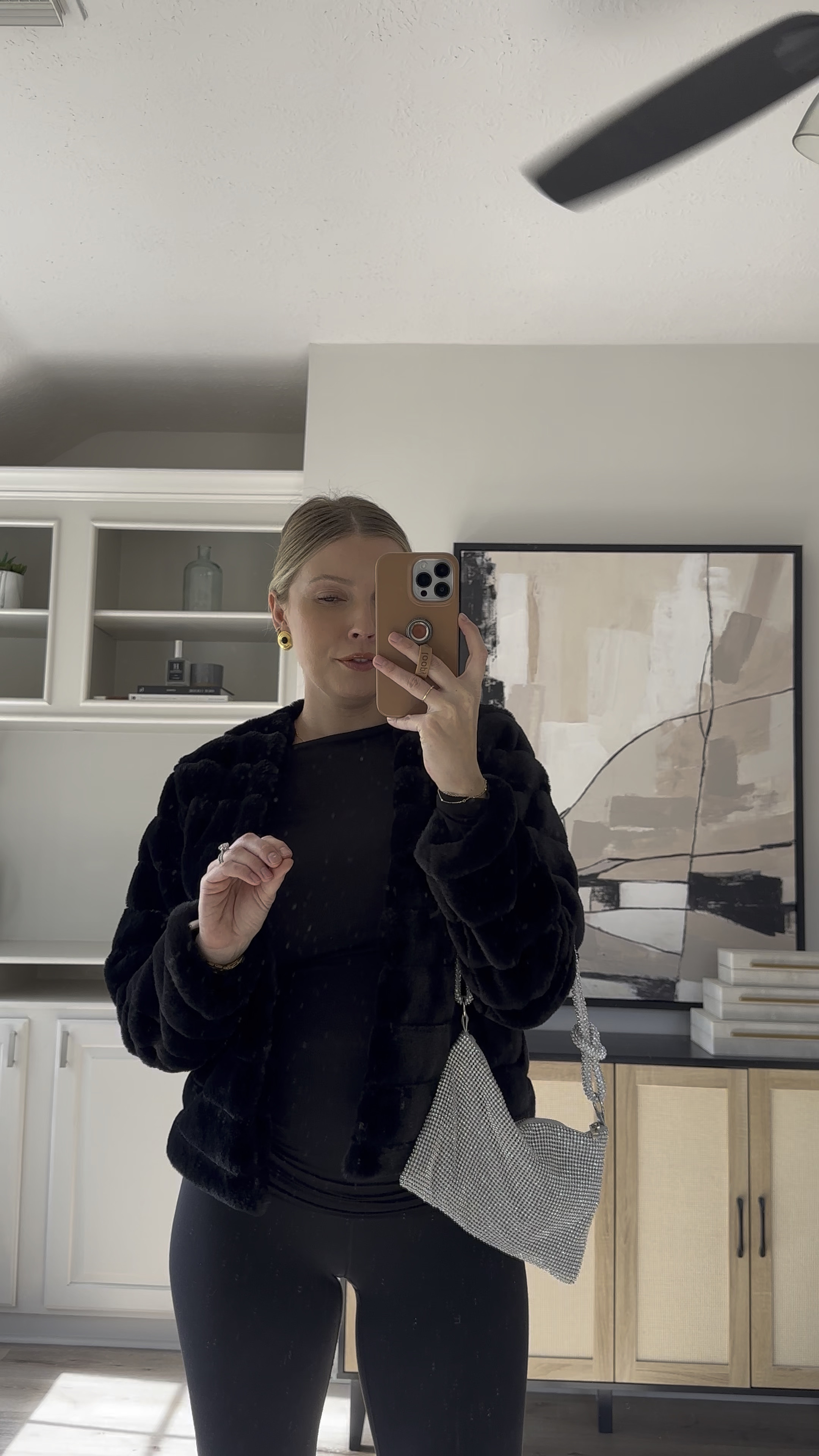 Holiday Outfit Inspo | casual festive outfit: faux fur jacket in size M but wish I would have done L, asymmetrical long sleeve in S, leggings in size S, knee boots tts.

#LTKHoliday #LTKParties #LTKBump