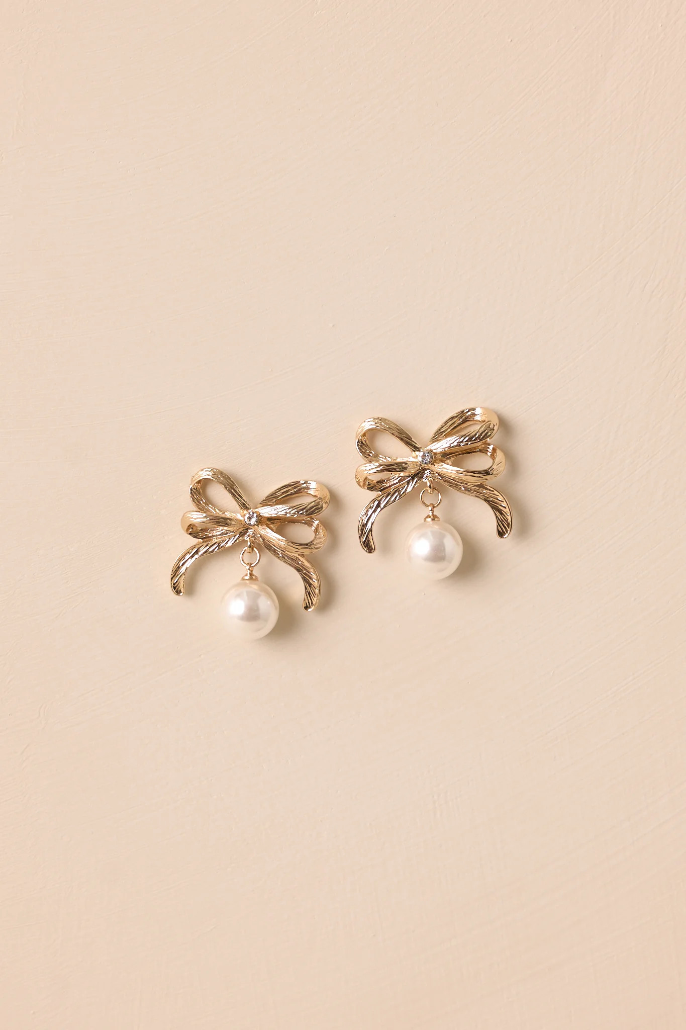 Timeless Moments Gold & Ivory Pearl Bow Earrings | Red Dress