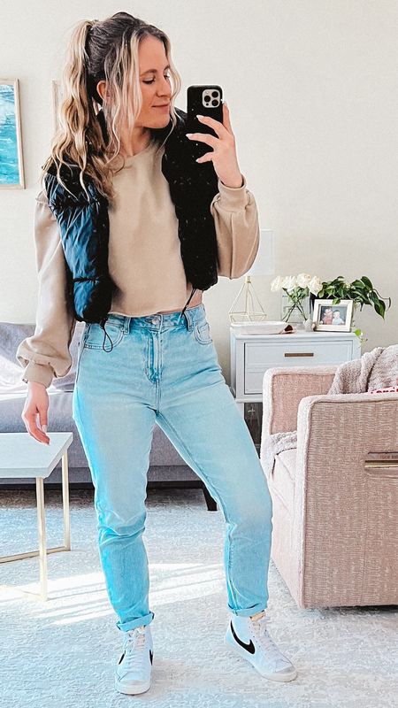 Cute Casual Outfit Inspo | For a put together but casual look, I love to pair jeans with a cropped crewneck and add some white sneakers! casual outfits, winter casual outfit, puffer vest, sweatshirt outfit, neutral outfit

#LTKstyletip #LTKshoecrush