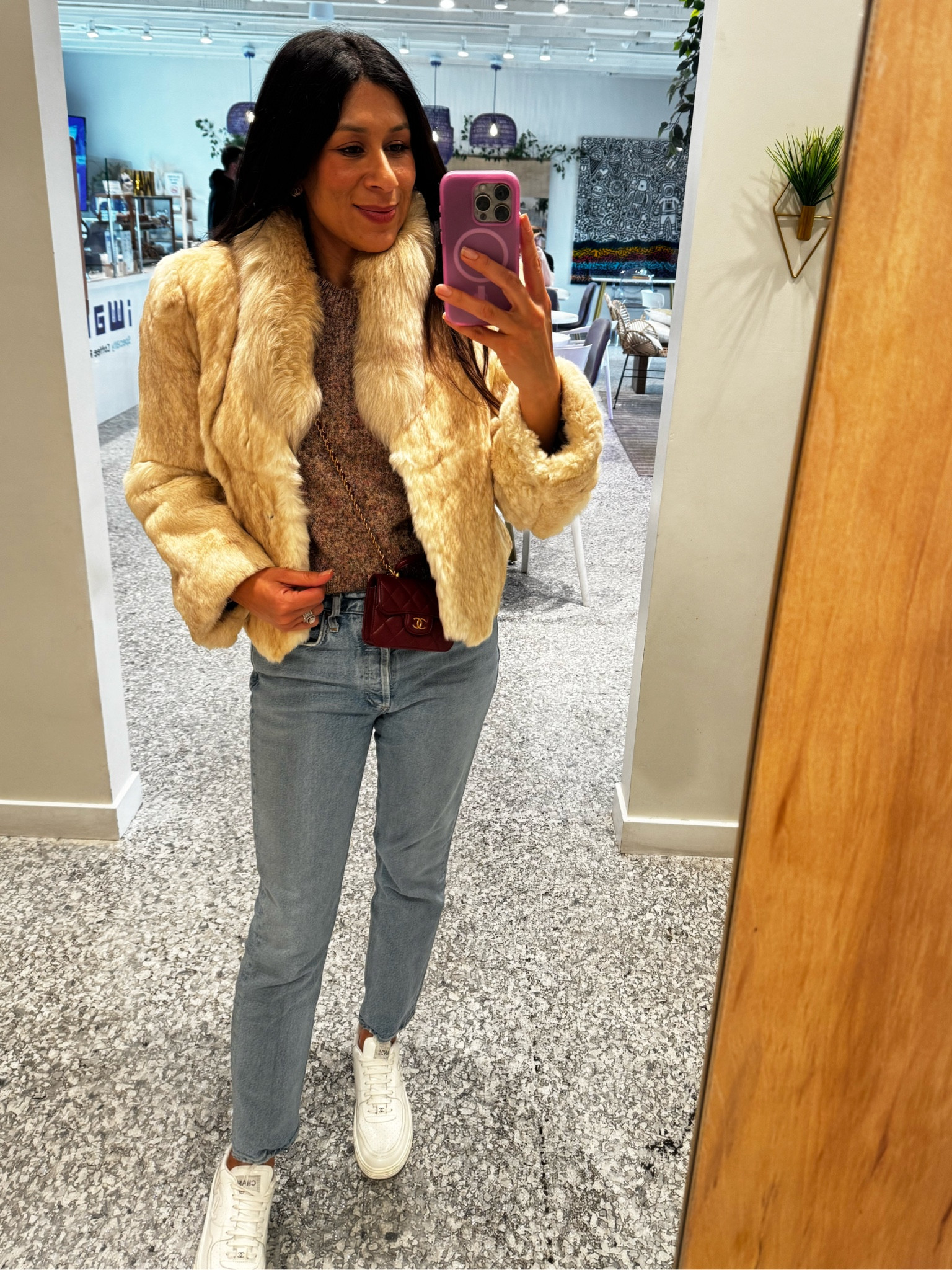 Cozy layers and casual vibes ✨ Mixing textures with my vintage fur jacket, knit sweater, classic denim and mini Chanel crossbody—perfect for a day out! #OOTD #WinterStyle
